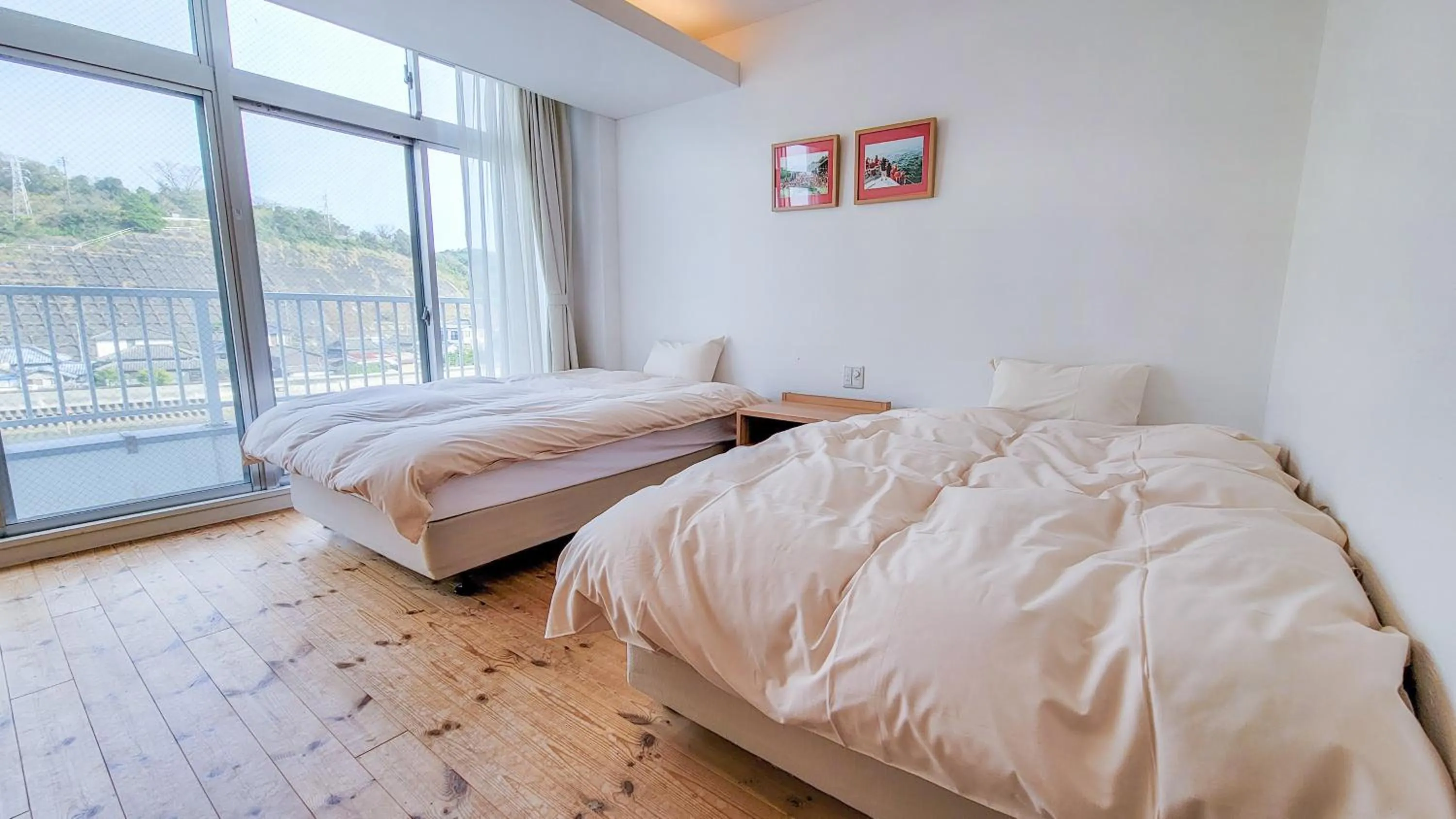 Bed in Amakusa Santacoming Hotel