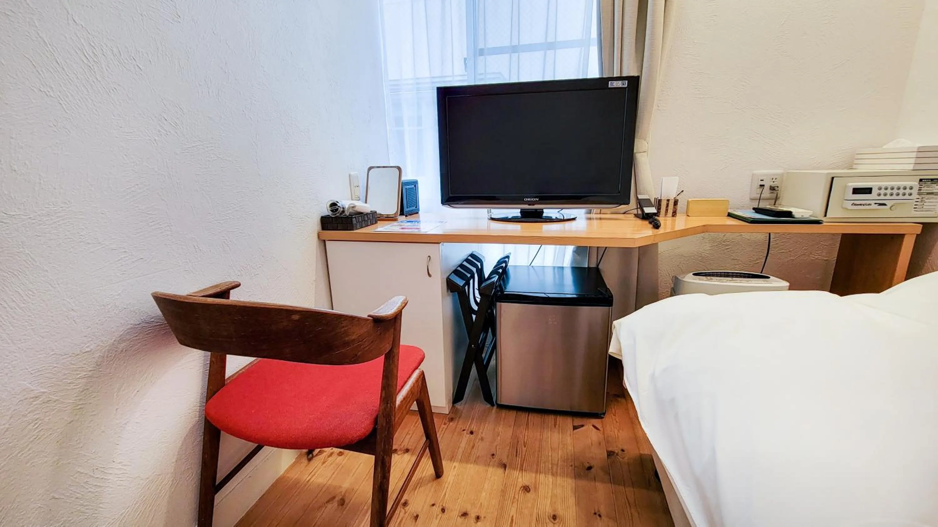 Bed in Amakusa Santacoming Hotel