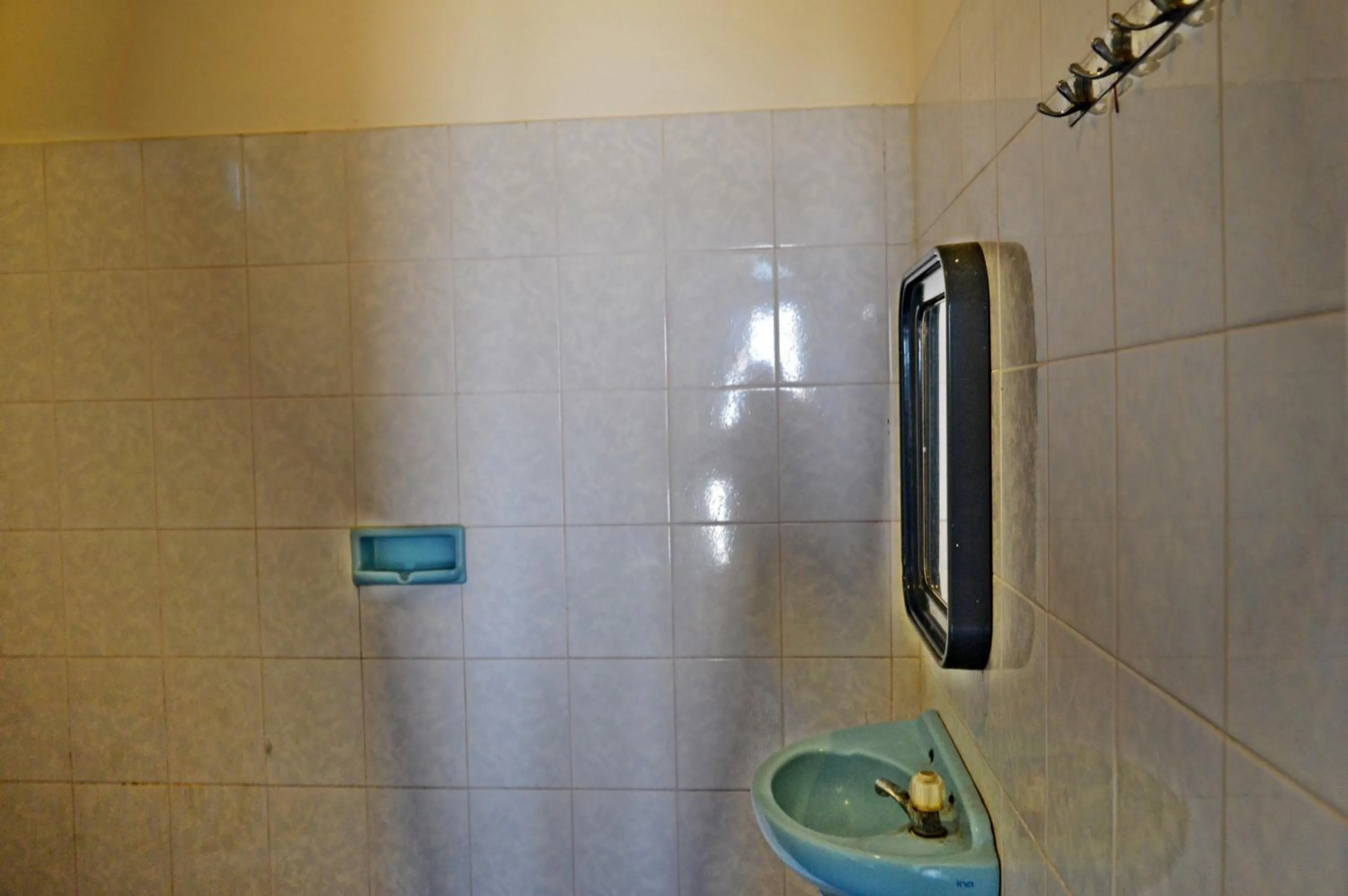 Bathroom in Yulia 2 Homestay Sanur