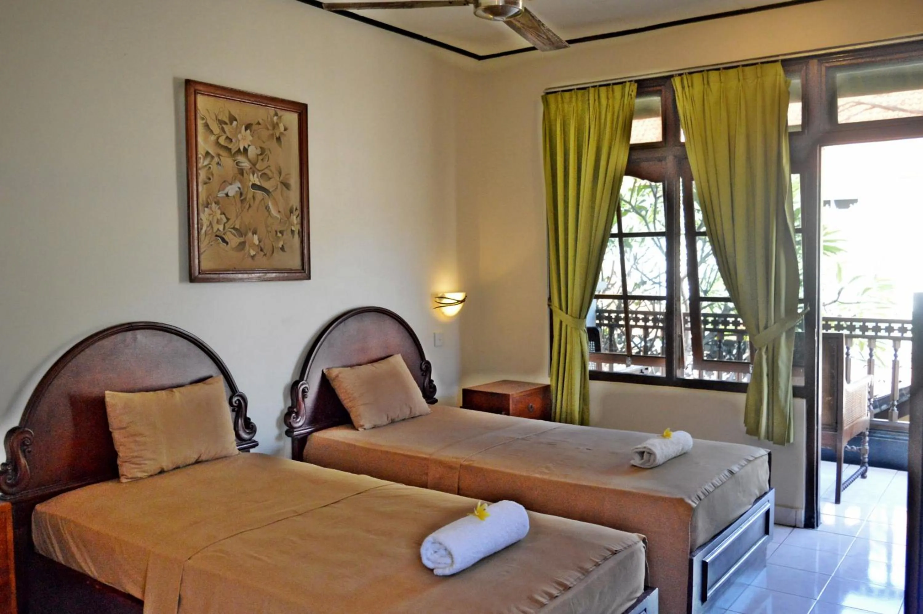 Bed in Yulia 2 Homestay Sanur