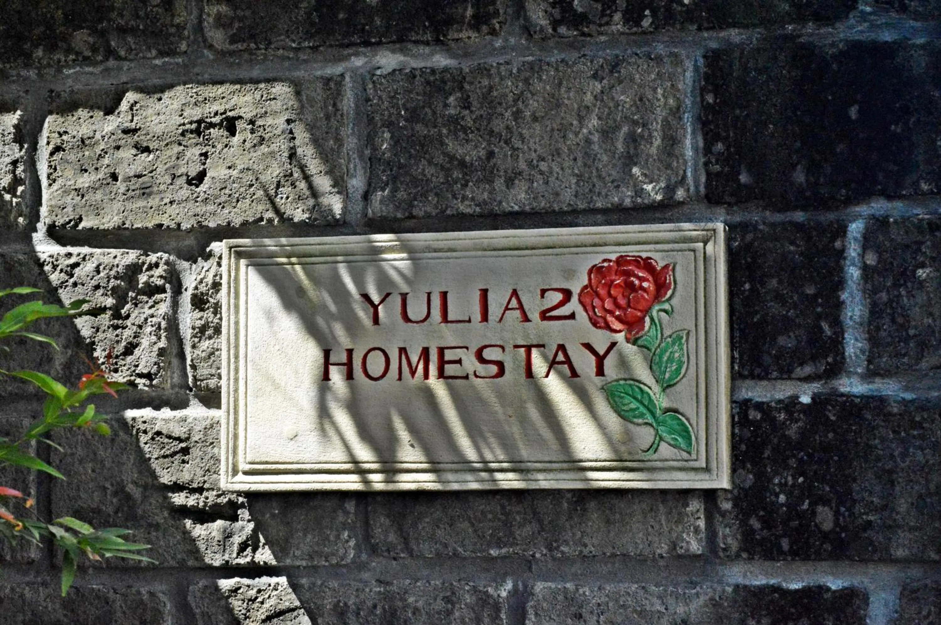 Property logo or sign in Yulia 2 Homestay Sanur