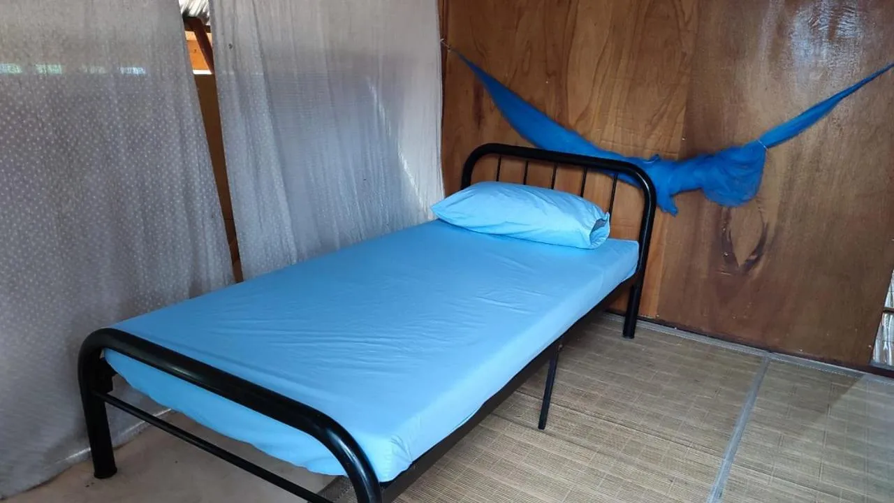 Bed in Taun Gusi Village Homestay