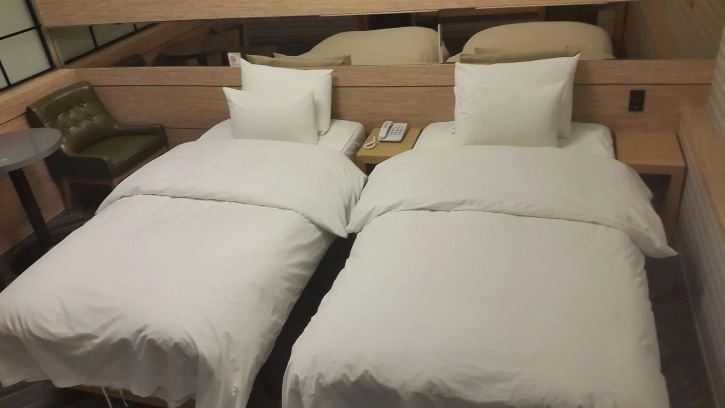 Bed in Jinju Kai Hotel