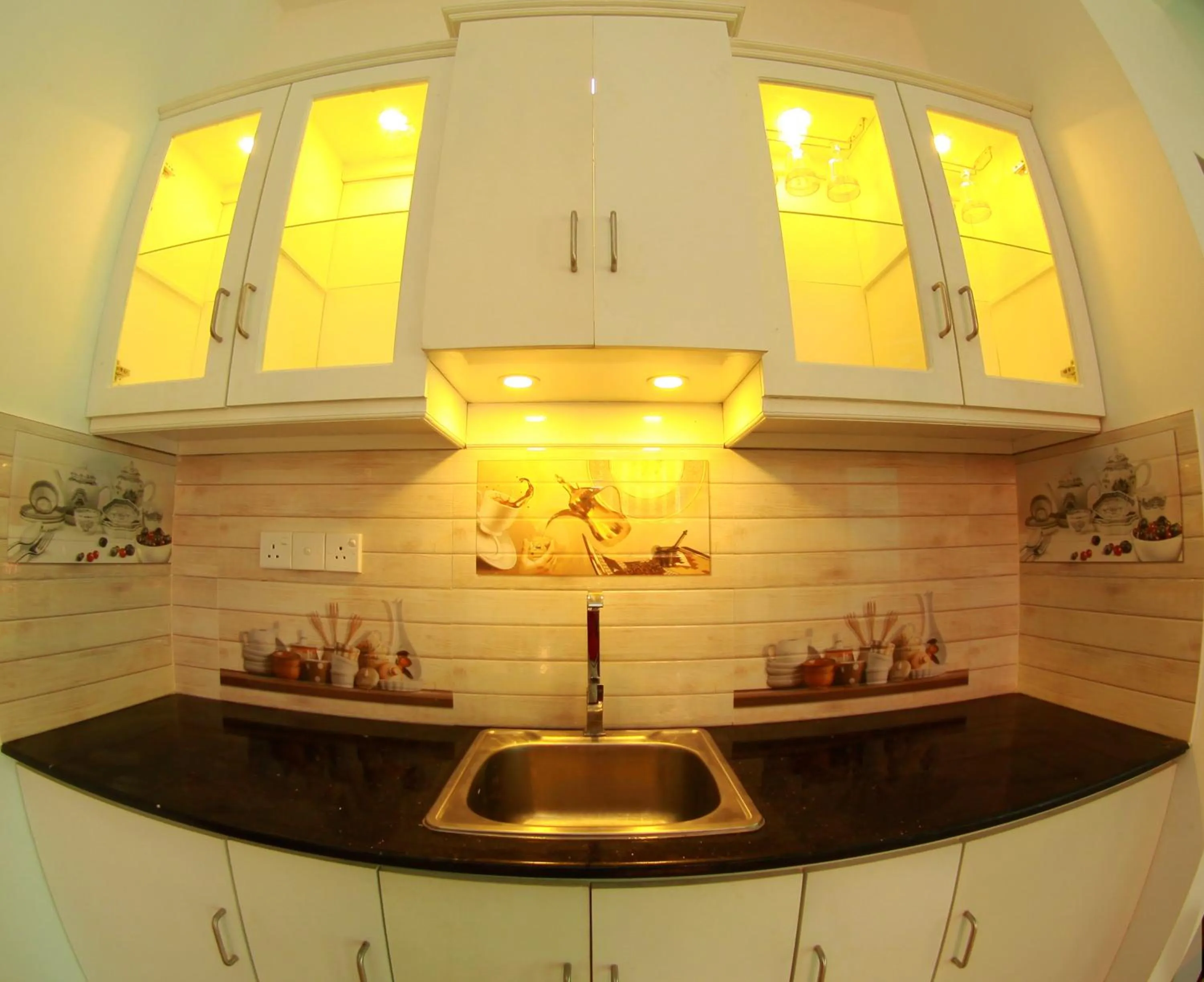 Communal kitchen in Grand Residence