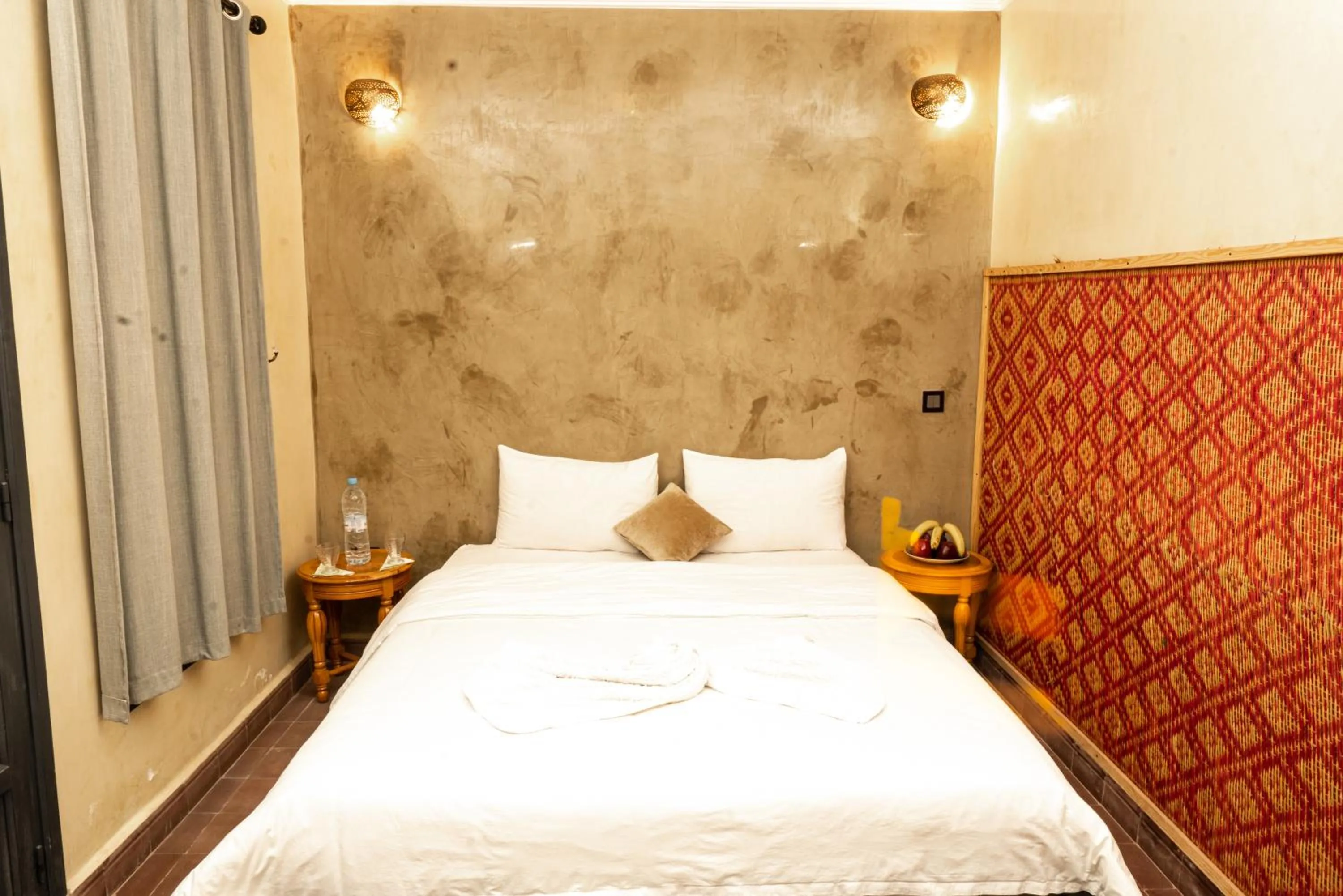 Bed in Riad Abjaou