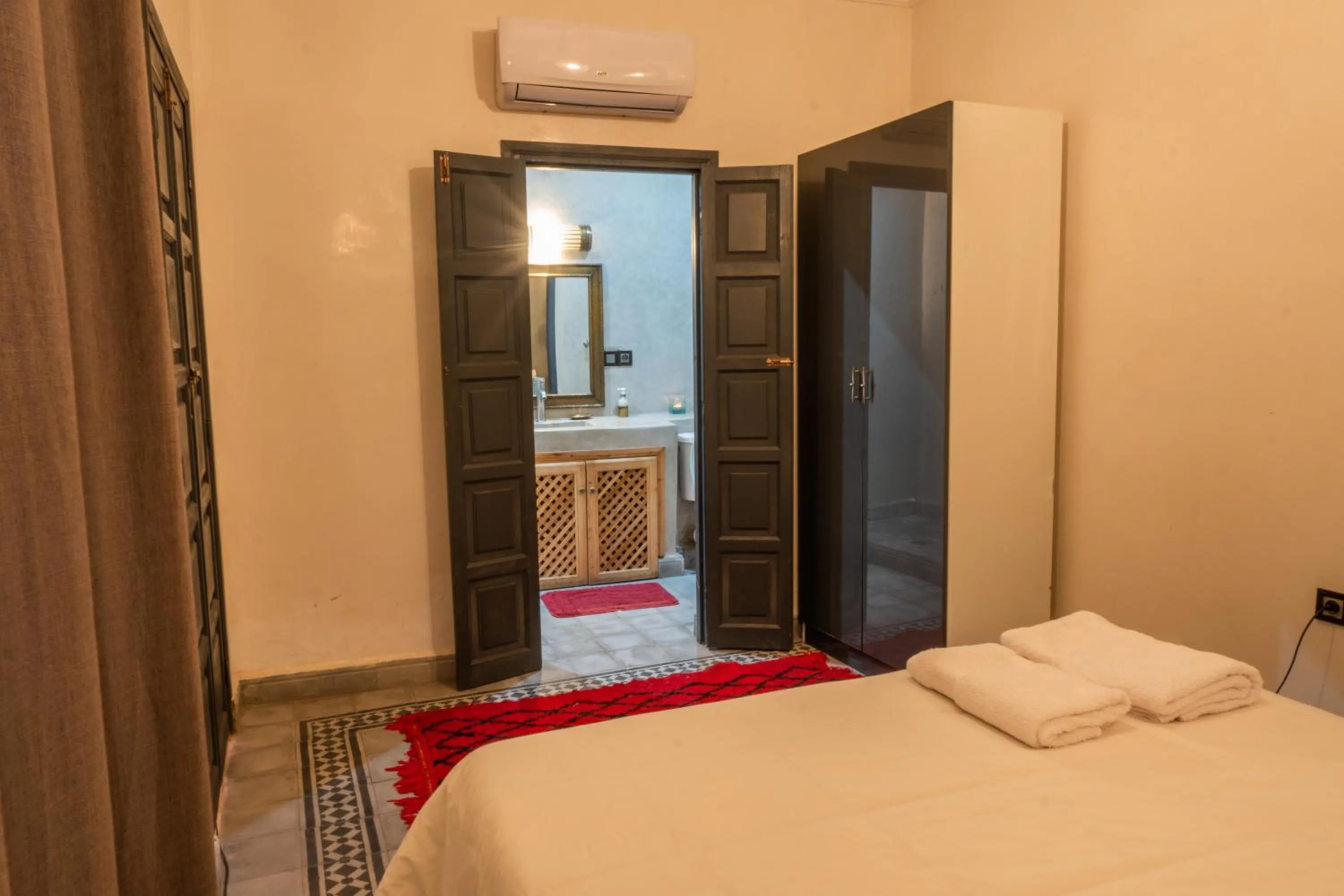 Bed in Riad Abjaou