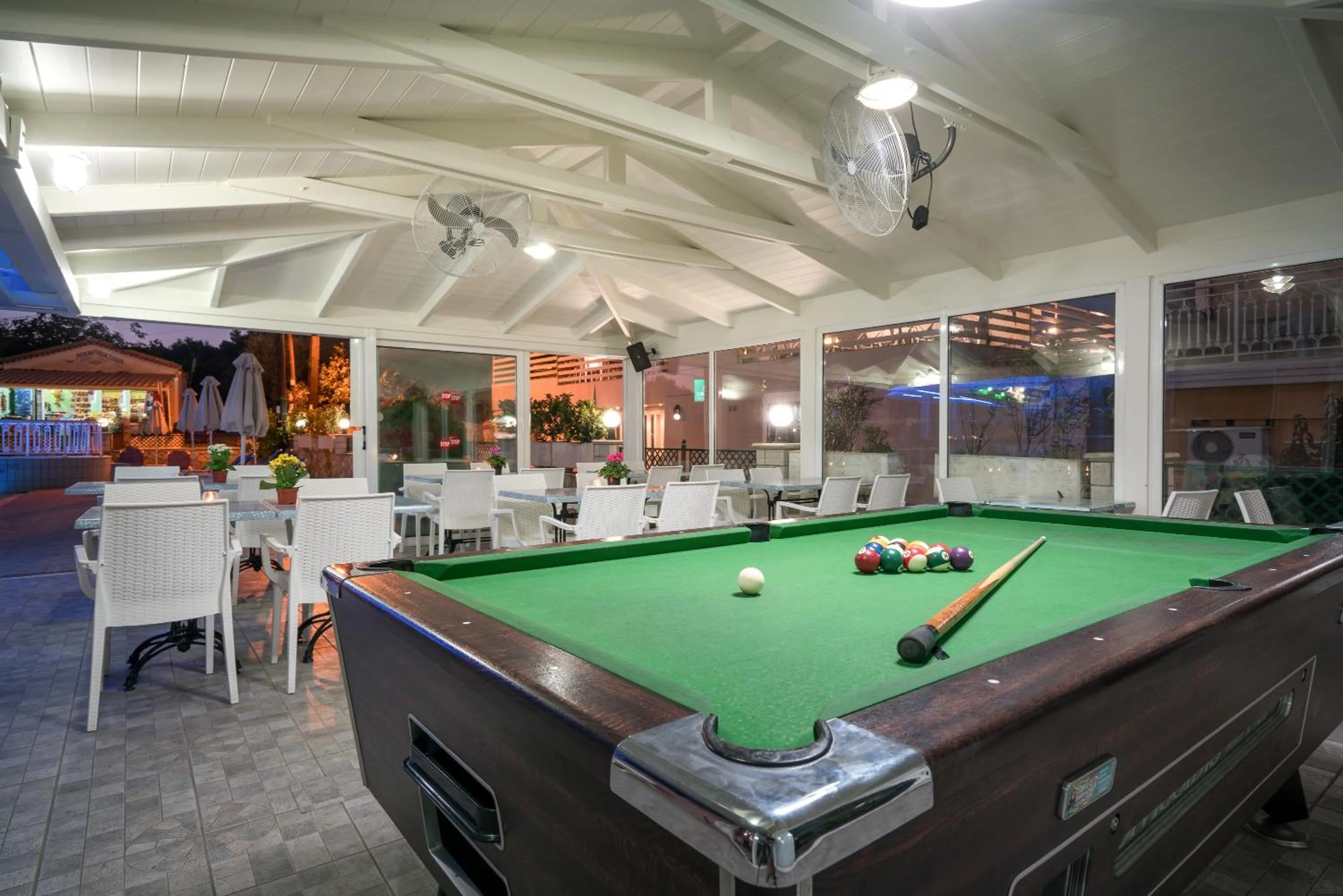 Communal lounge/ TV room in Alamis Hotel & Apartments