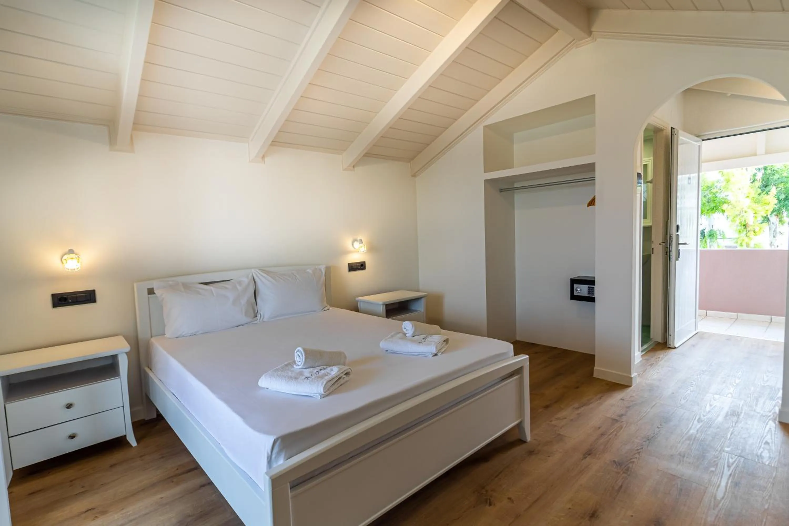 Bed in Alamis Hotel & Apartments