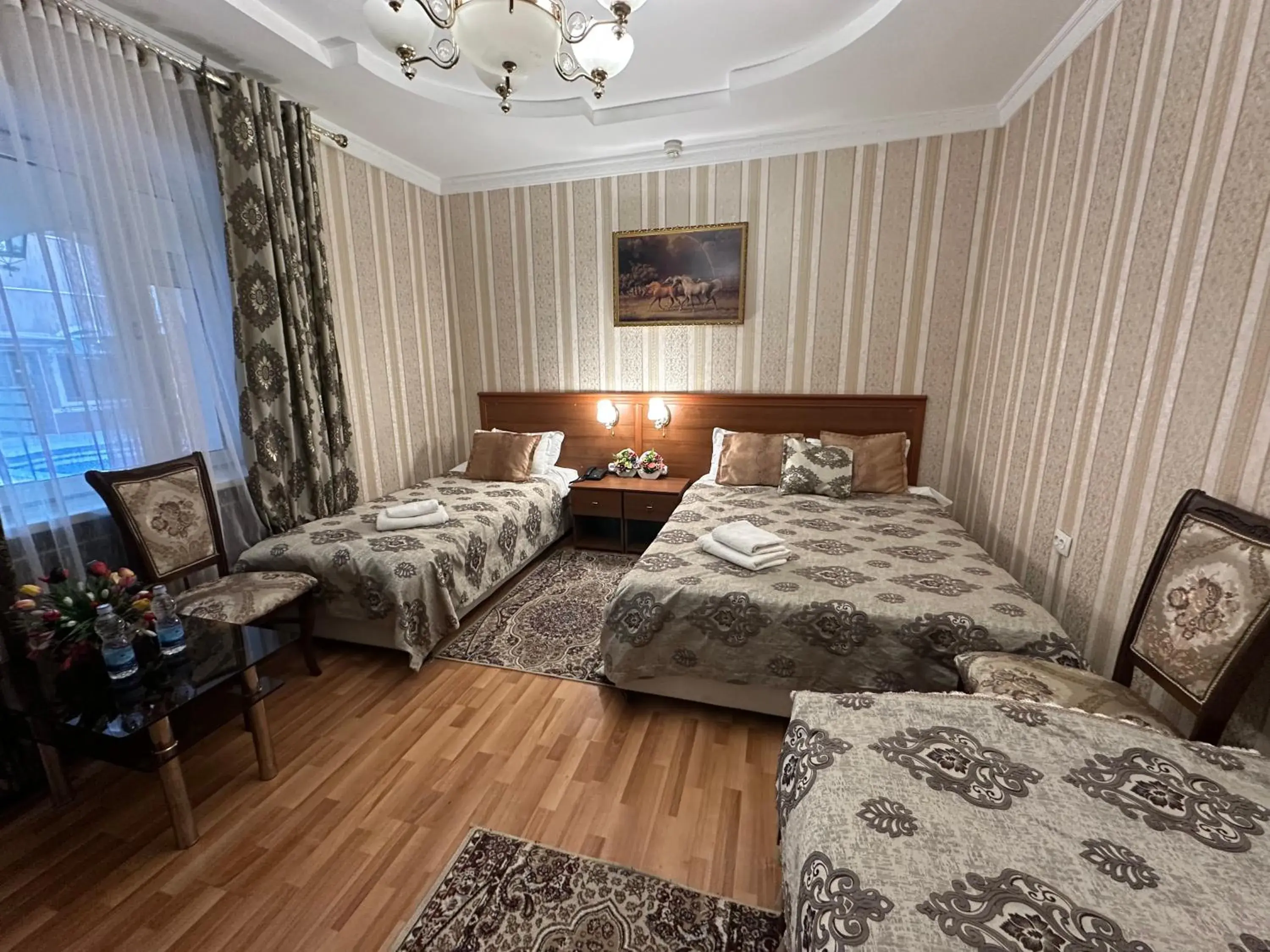 Comfort Quadruple Room - single occupancy in Sarbon Hotel Tashkent Comfort Quadruple Room - single occupancy in Sarbon Hotel Tashkent