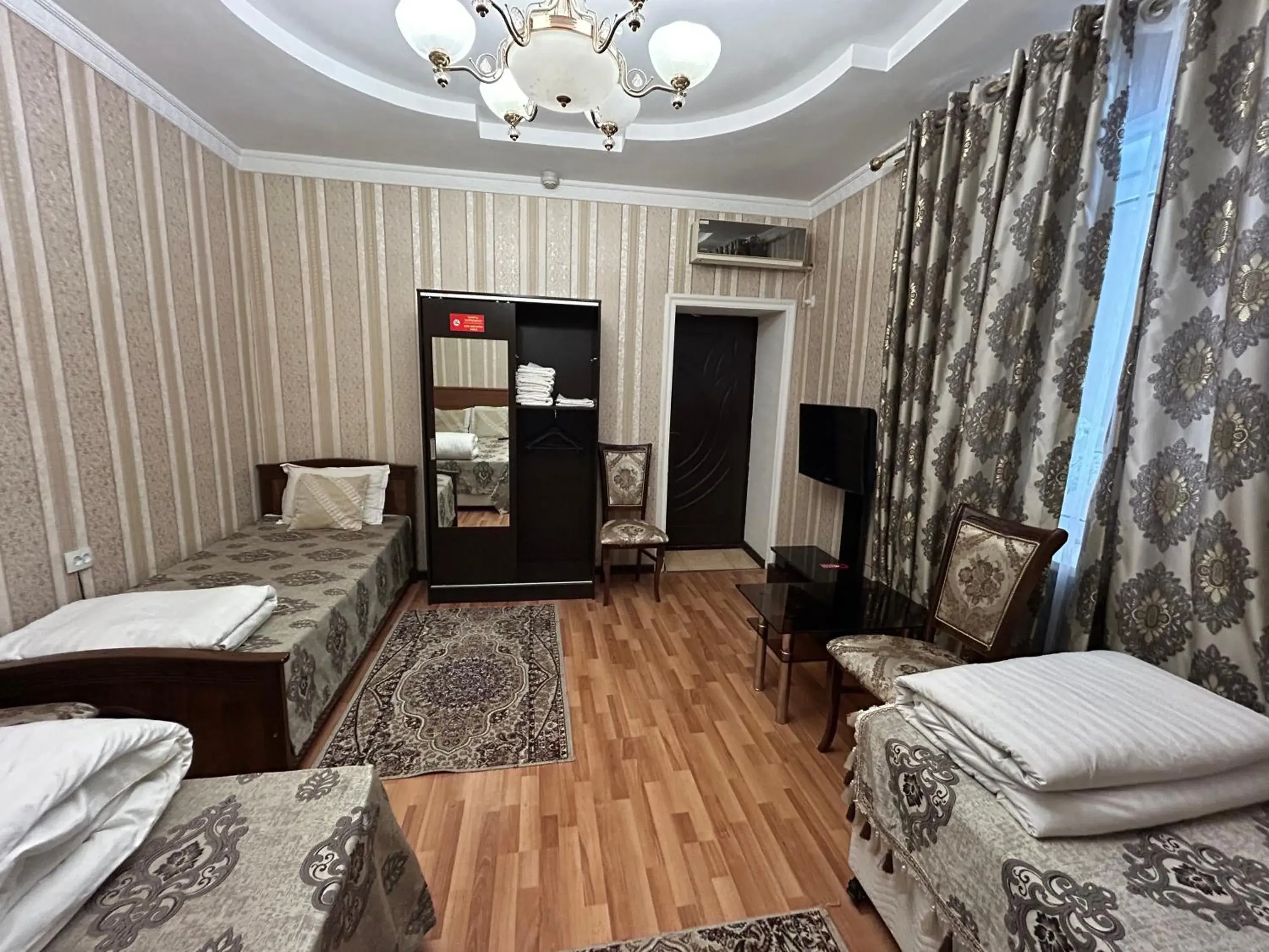Comfort Quadruple Room - single occupancy in Sarbon Hotel Tashkent Comfort Quadruple Room - single occupancy in Sarbon Hotel Tashkent