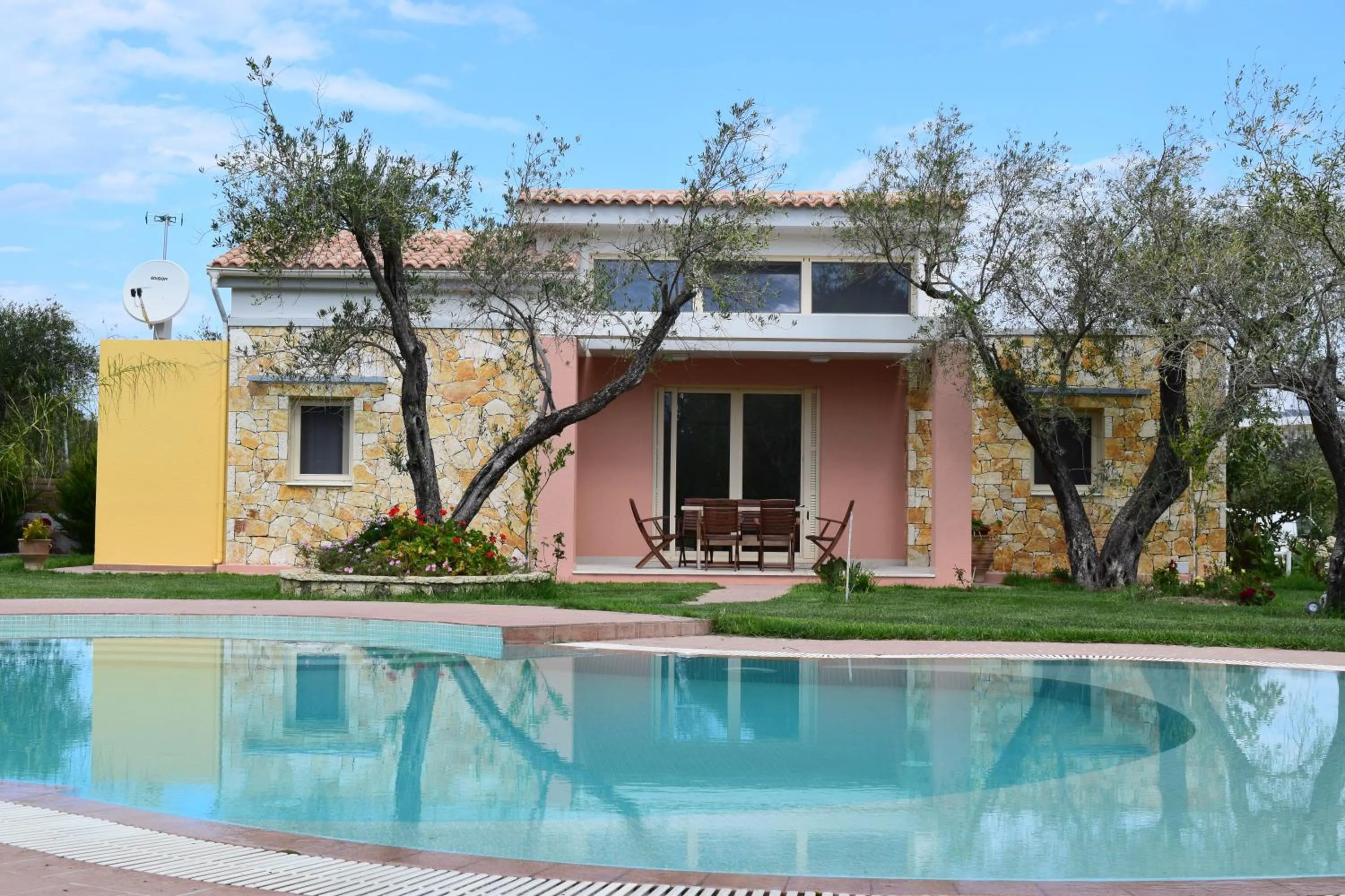 Swimming pool in Three Stars Luxury Villas