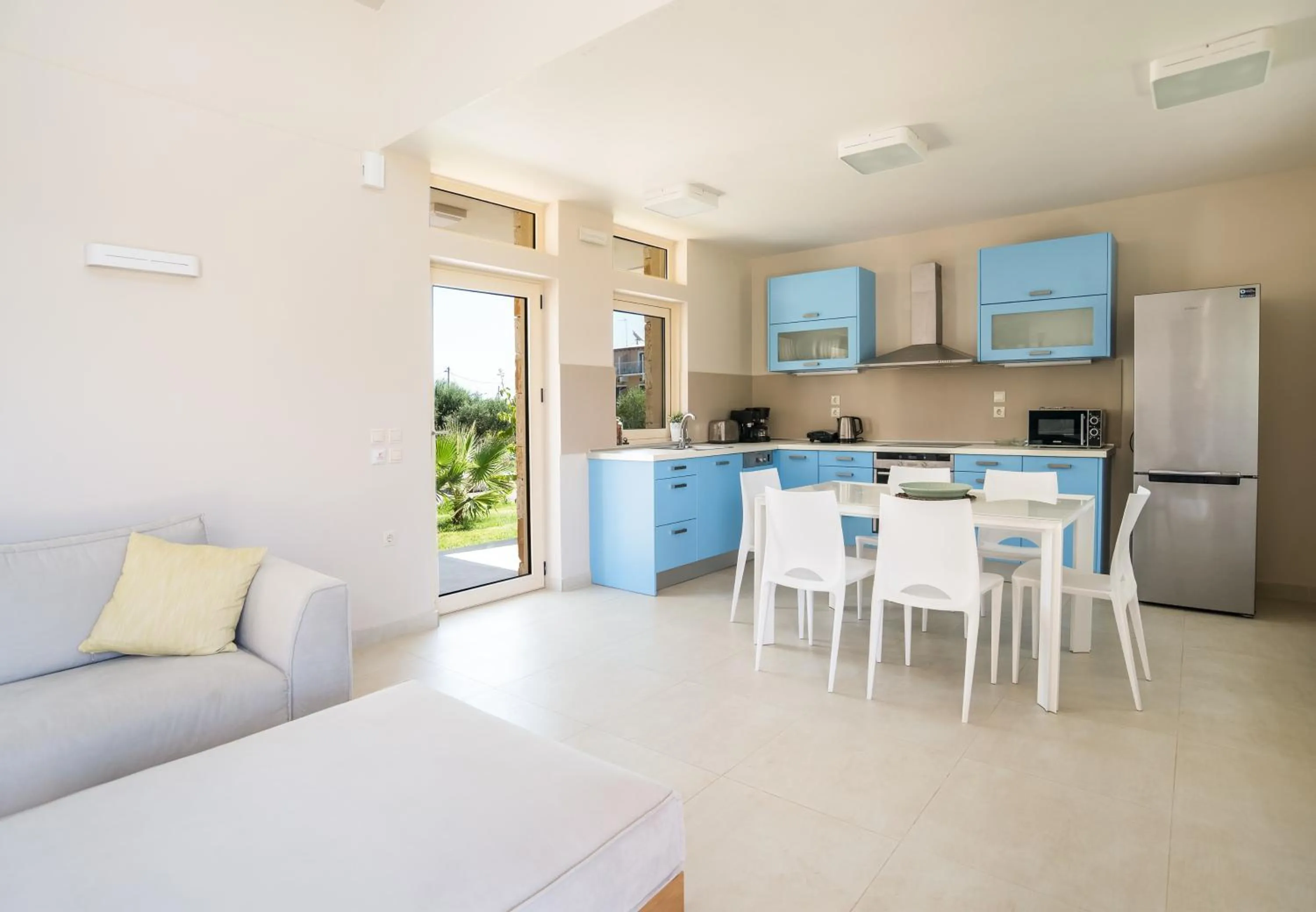 Kitchen or kitchenette in Three Stars Luxury Villas