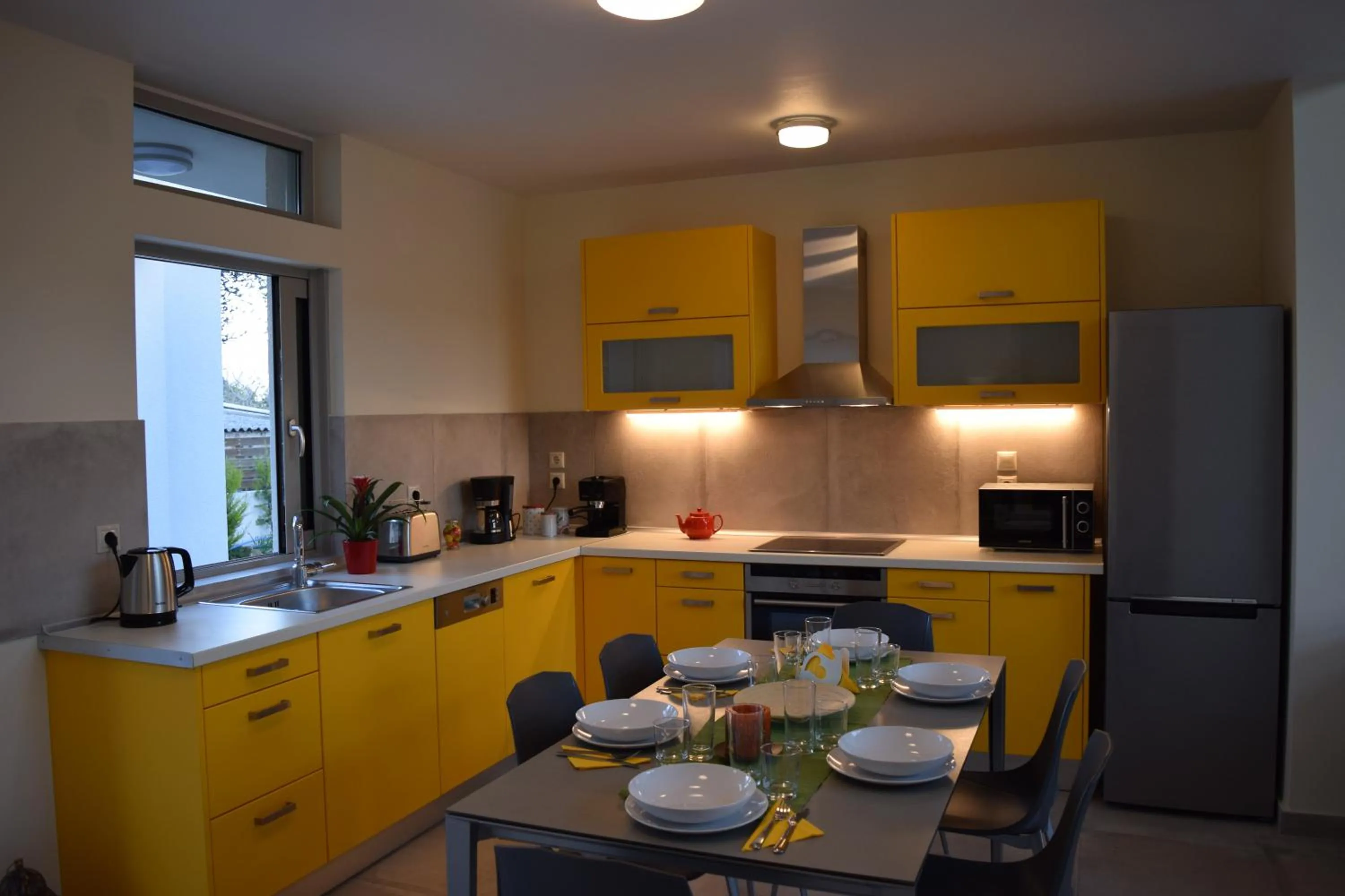 Kitchen or kitchenette in Three Stars Luxury Villas