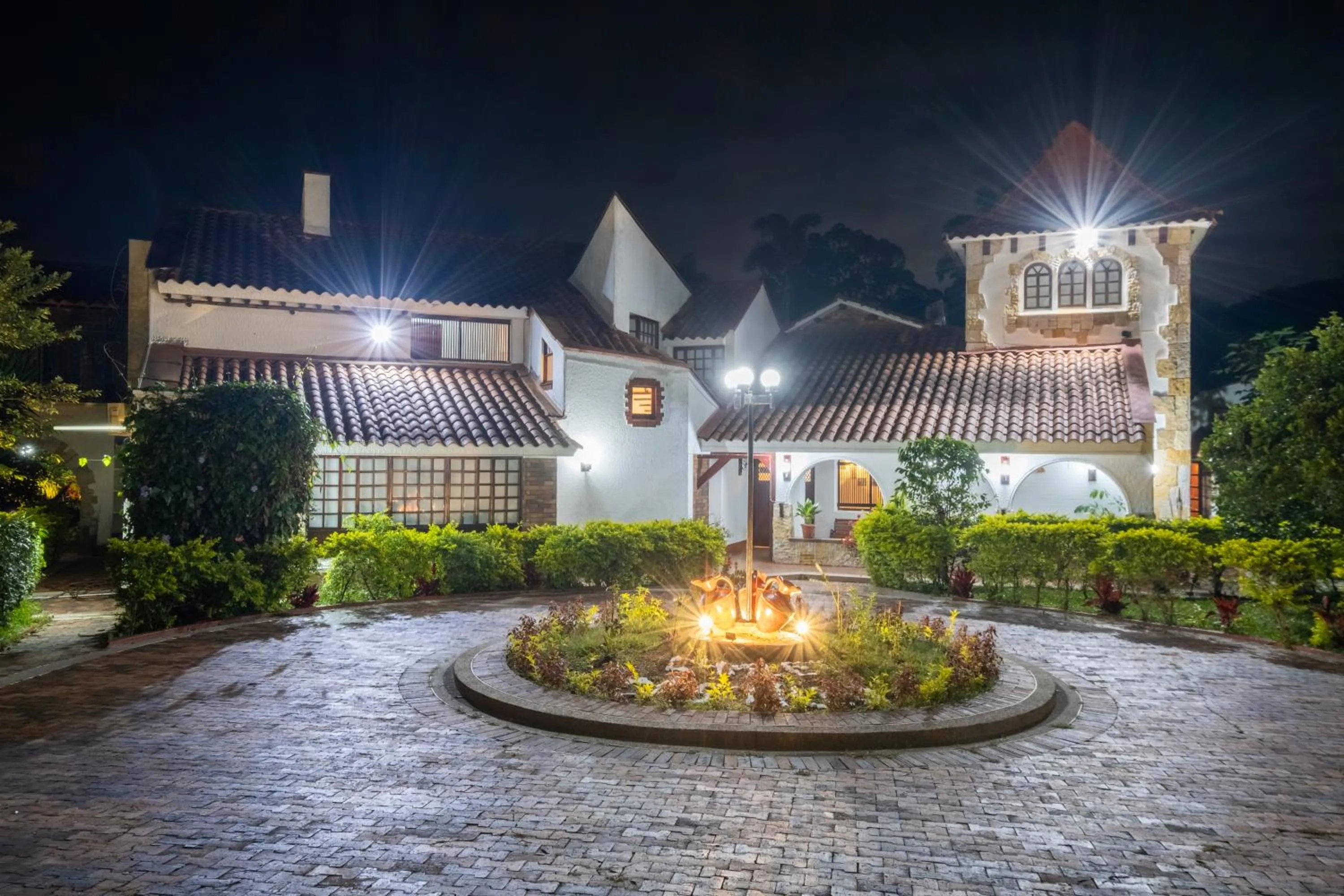 Property building in Hotel Chalet El Castillo by Majuva