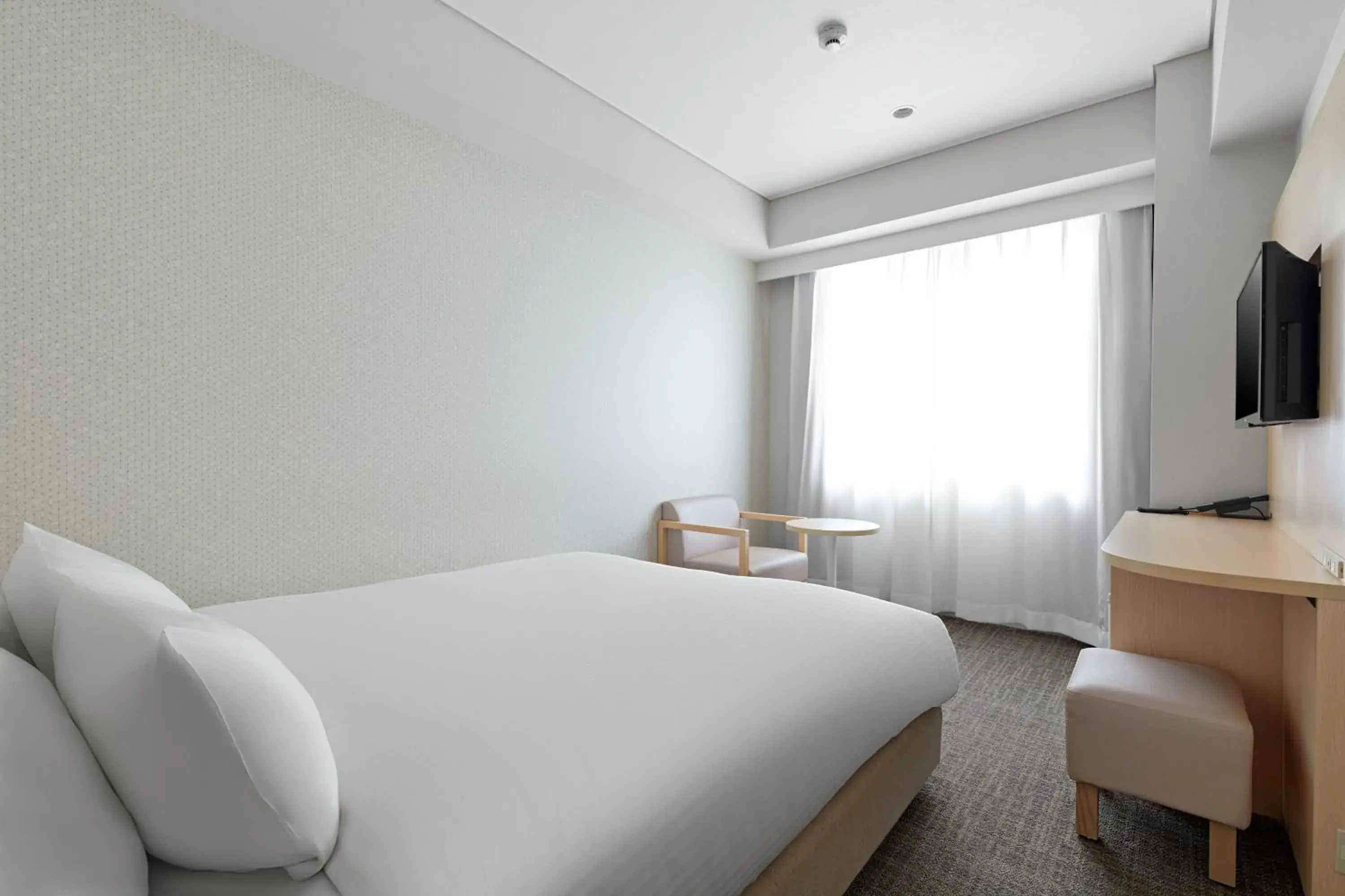 Bed in Sotetsu Fresa Inn Kyoto-Hachijoguchi Bed in Sotetsu Fresa Inn Kyoto-Hachijoguchi