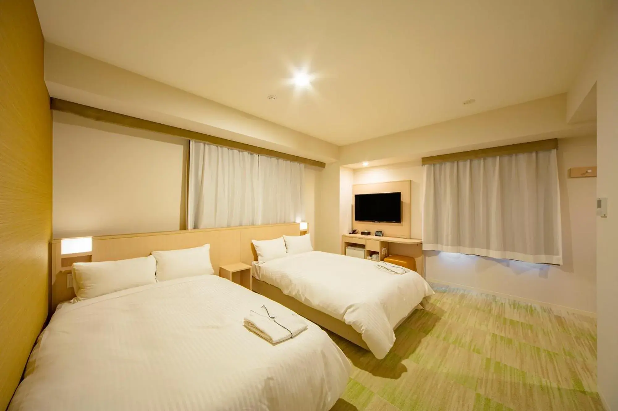 Bed in Sotetsu Fresa Inn Kyoto-Shijokarasuma Bed in Sotetsu Fresa Inn Kyoto-Shijokarasuma