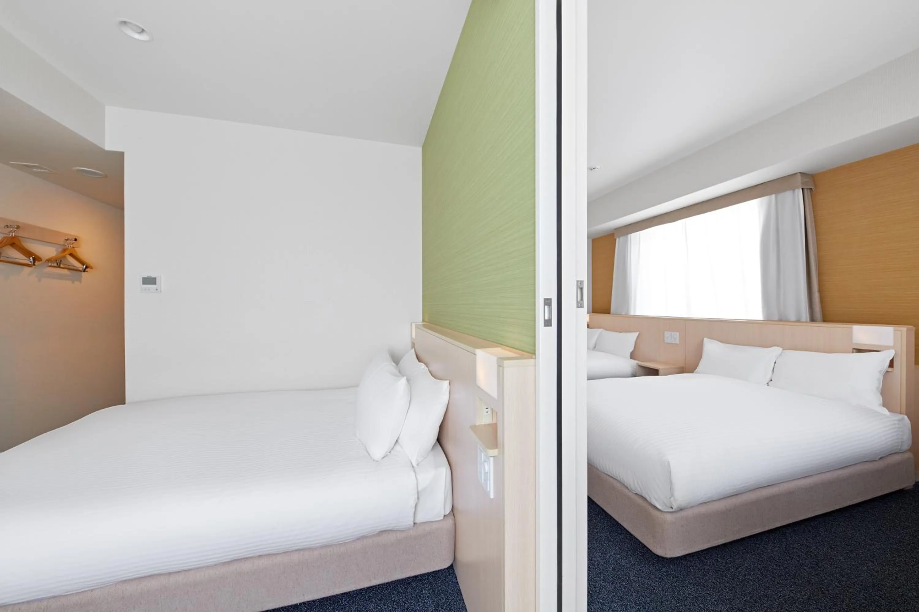 Bed in Sotetsu Fresa Inn Kyoto-Shijokarasuma