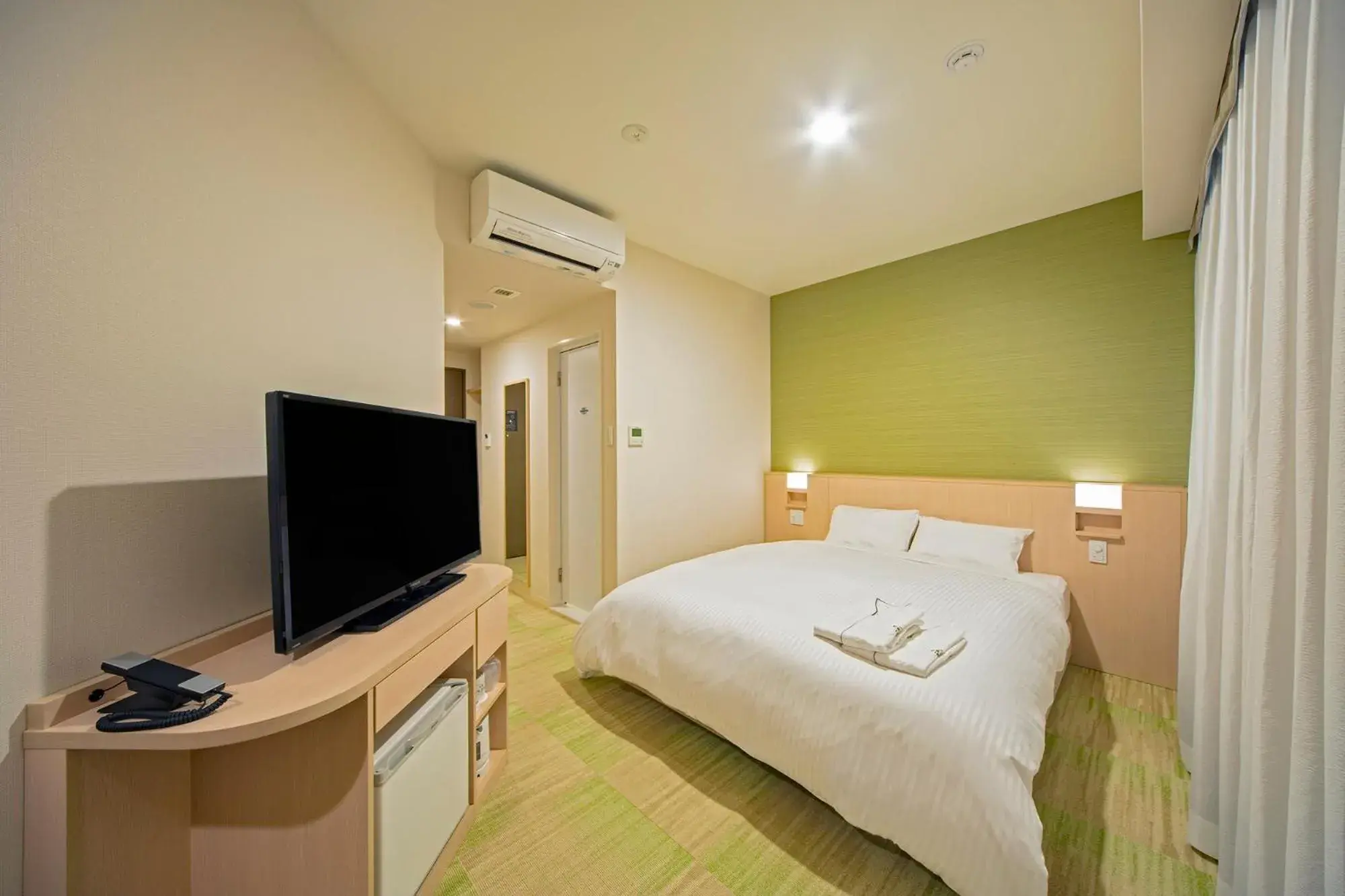 Bed in Sotetsu Fresa Inn Kyoto-Shijokarasuma Bed in Sotetsu Fresa Inn Kyoto-Shijokarasuma