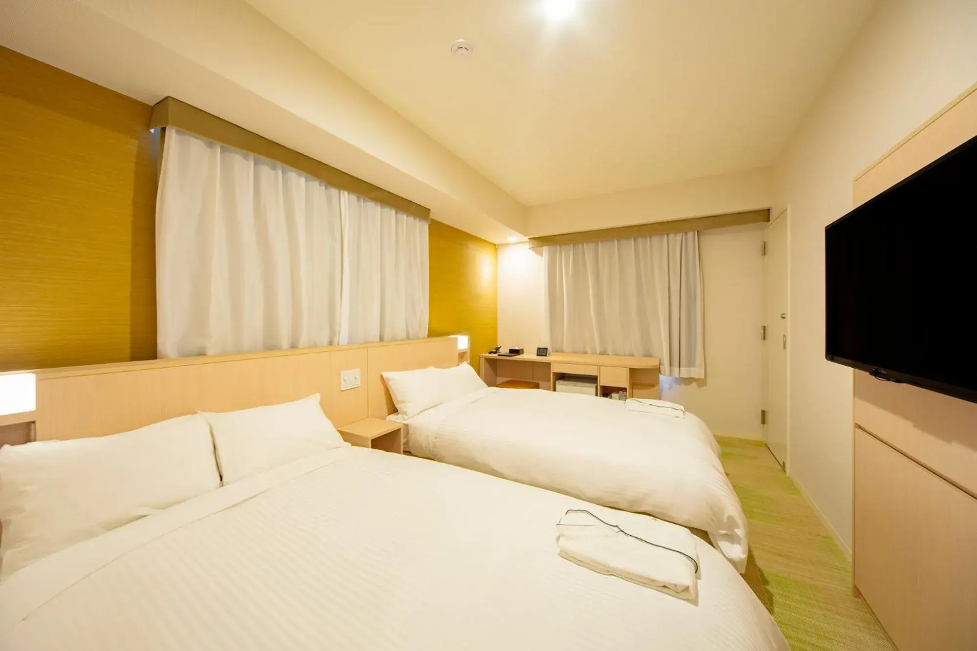 Bed in Sotetsu Fresa Inn Kyoto-Shijokarasuma Bed in Sotetsu Fresa Inn Kyoto-Shijokarasuma