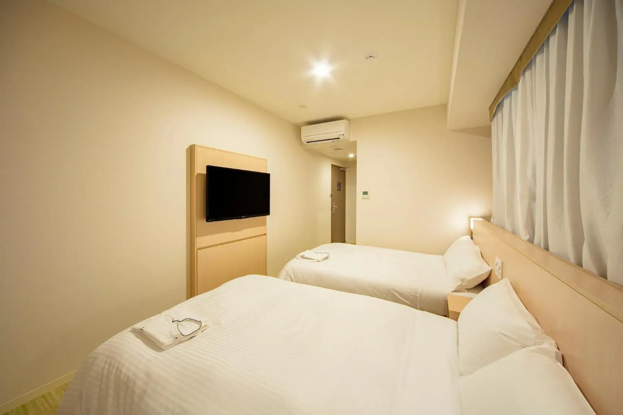 Bed in Sotetsu Fresa Inn Kyoto-Shijokarasuma Bed in Sotetsu Fresa Inn Kyoto-Shijokarasuma