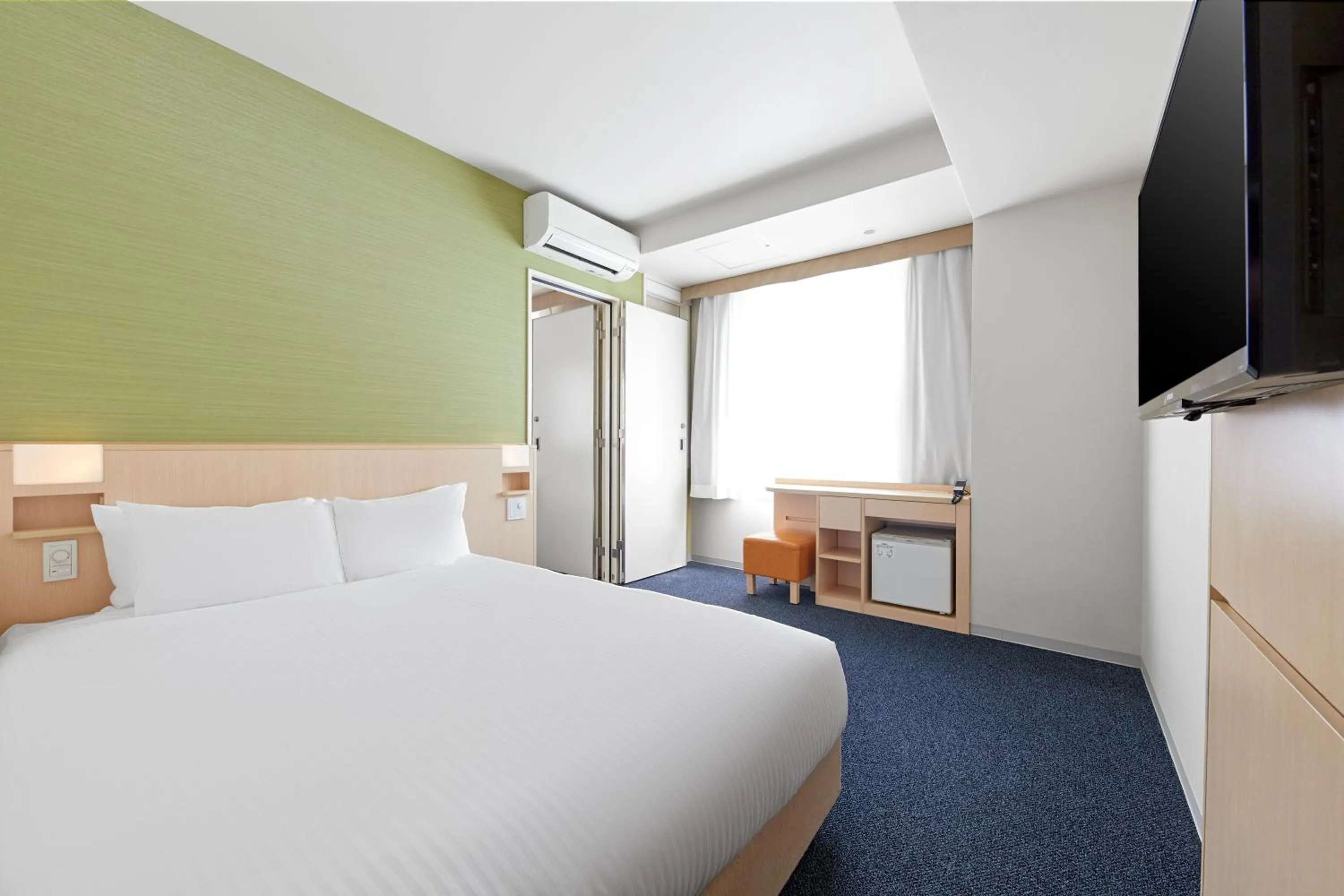 Bed in Sotetsu Fresa Inn Kyoto-Shijokarasuma