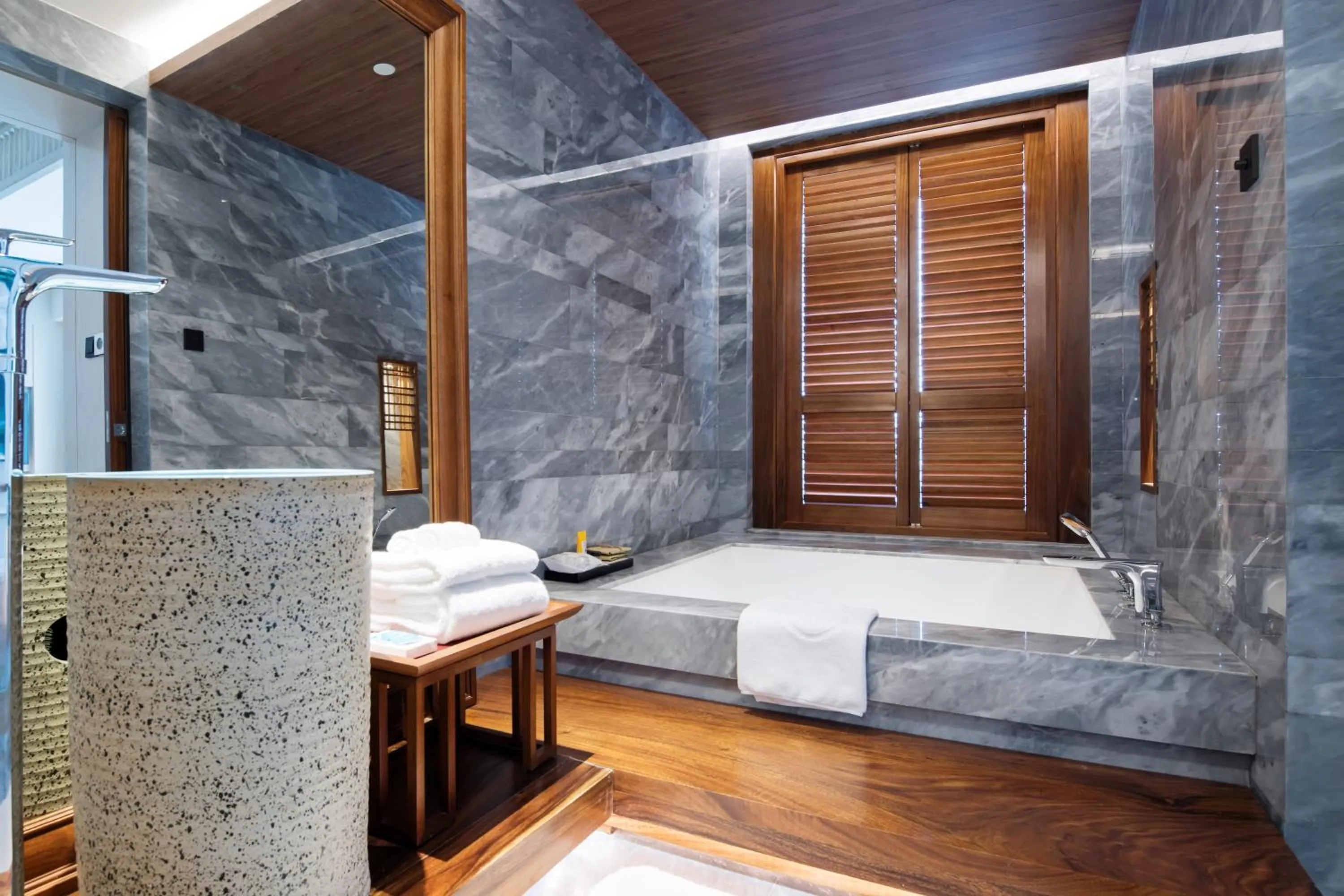 Toilet, Bed in The Anandi Hotel and SPA - Luxury Healing Hotel for Wellbeing