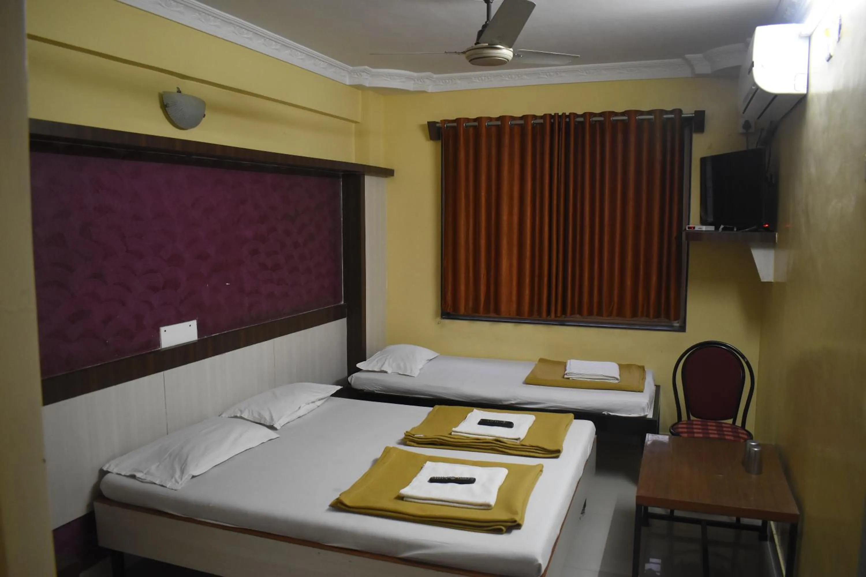 Bed in Hotel Sai Vishwa