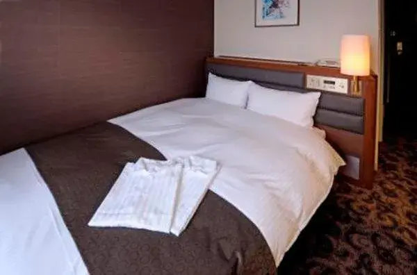 Bed in Hotel Plaza Kachigawa Bed in Hotel Plaza Kachigawa