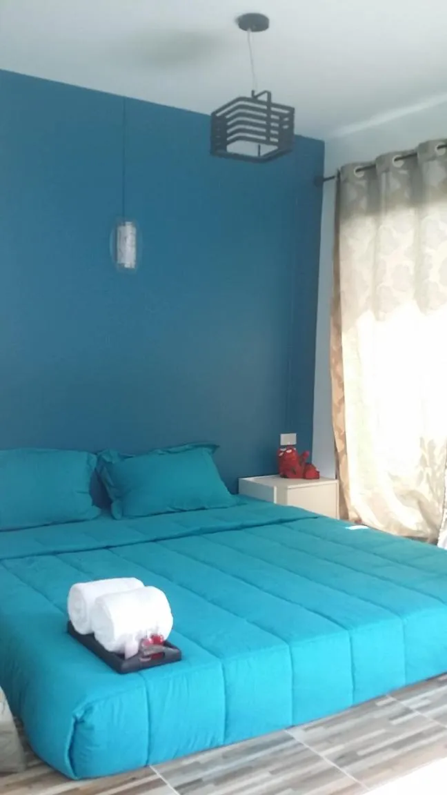 Property building, Bed in T'Luck House Resort