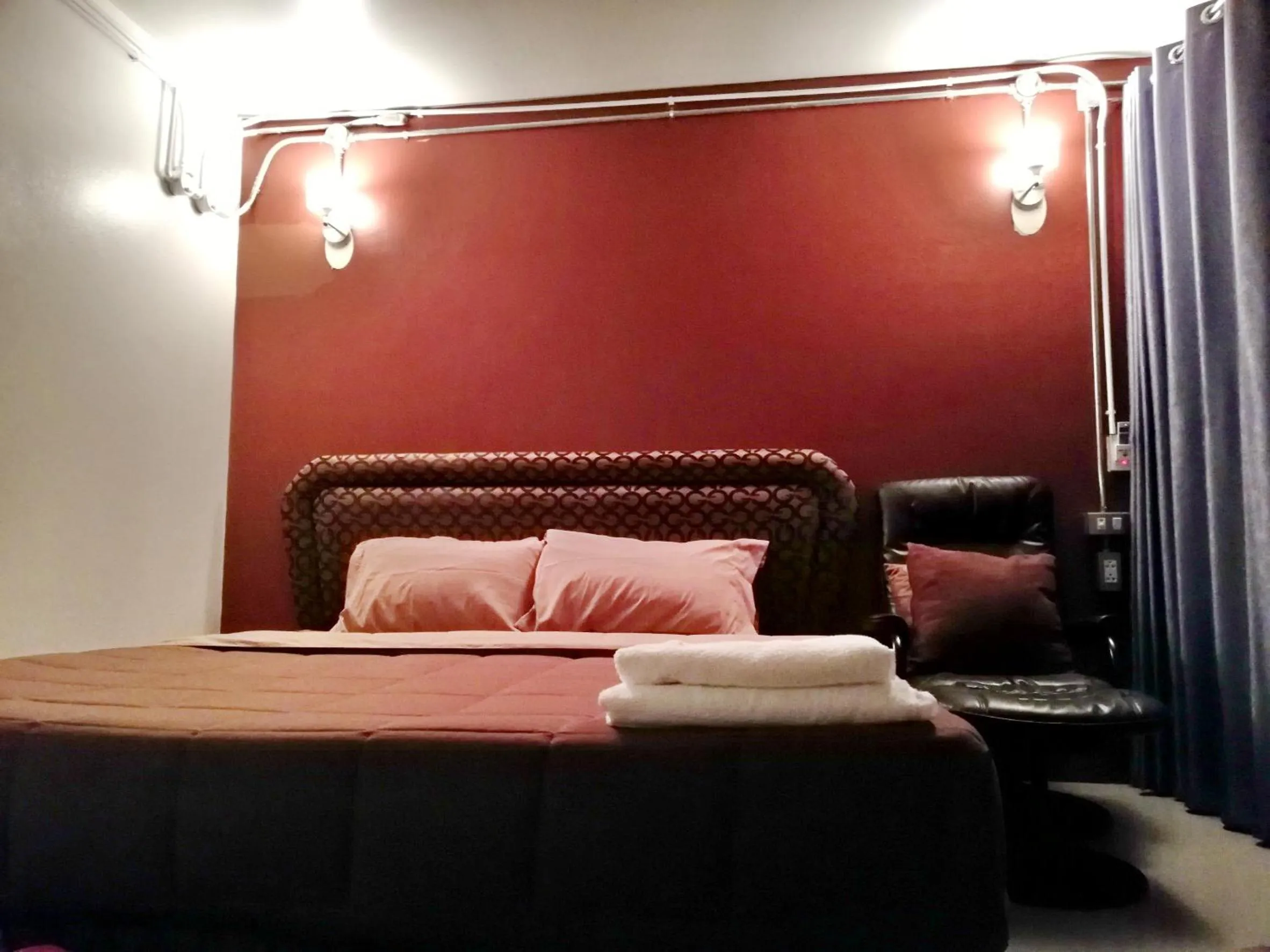 Bed in T'Luck House Resort