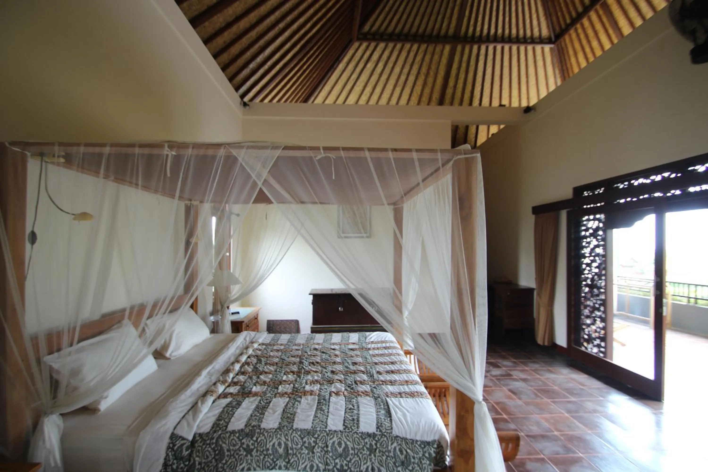 Bed in Uma Capung Mas Cottage