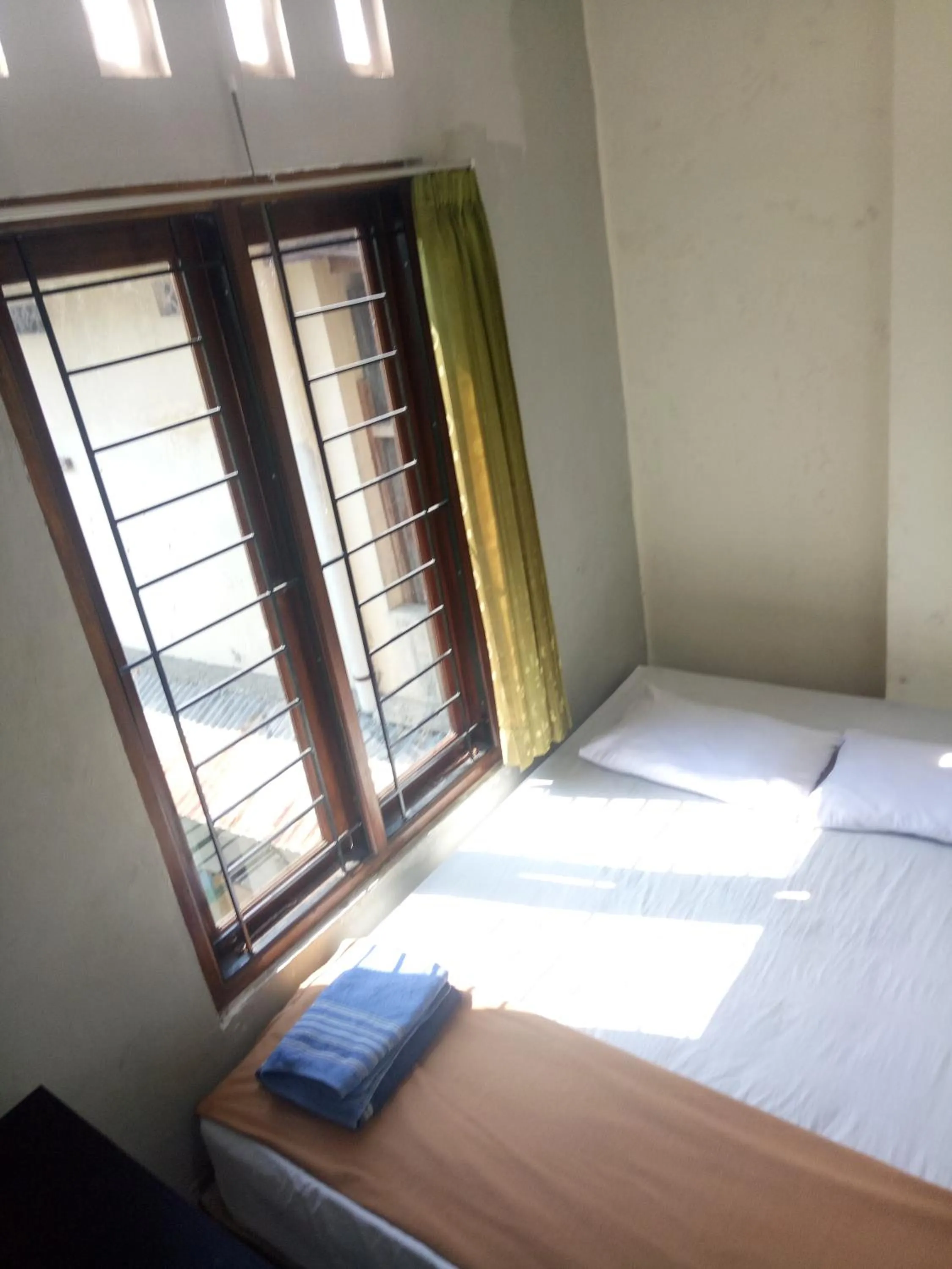 Bed in Losmen Fadel Malioboro Jogja