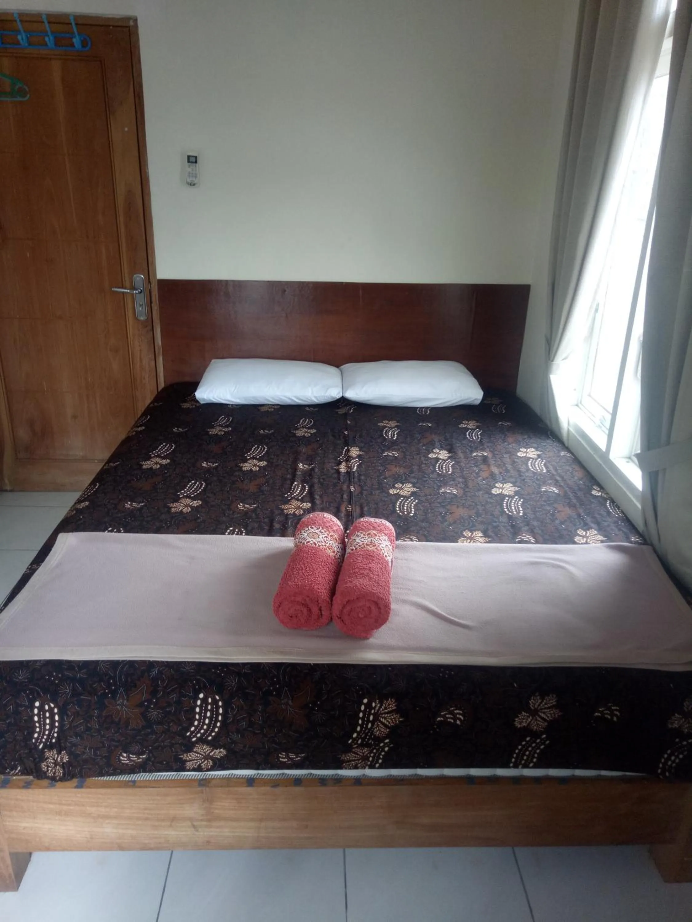 Property building, Bed in Losmen Fadel Malioboro Jogja