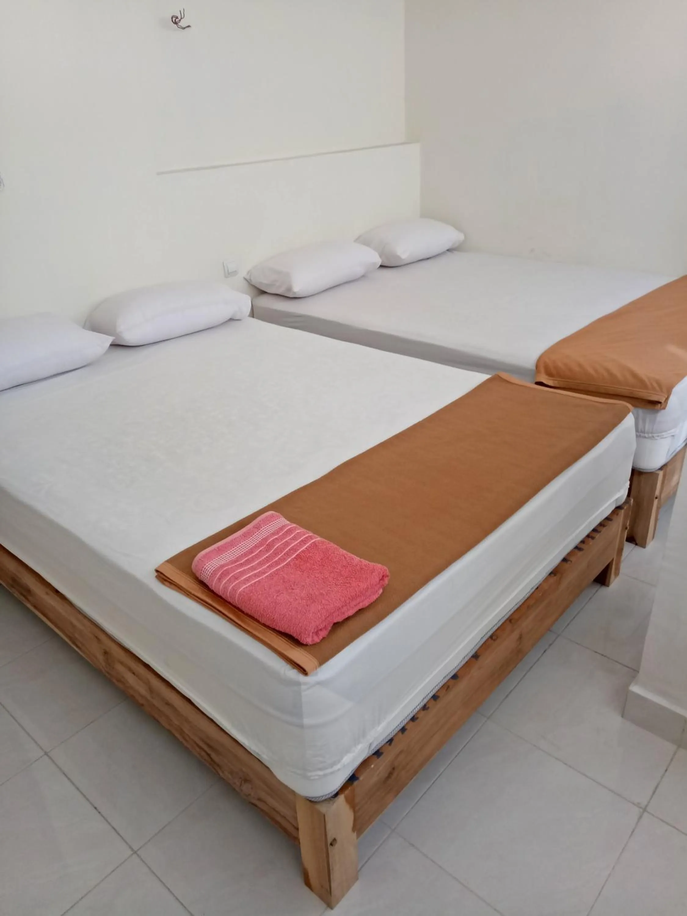 Bed in Losmen Fadel Malioboro Jogja