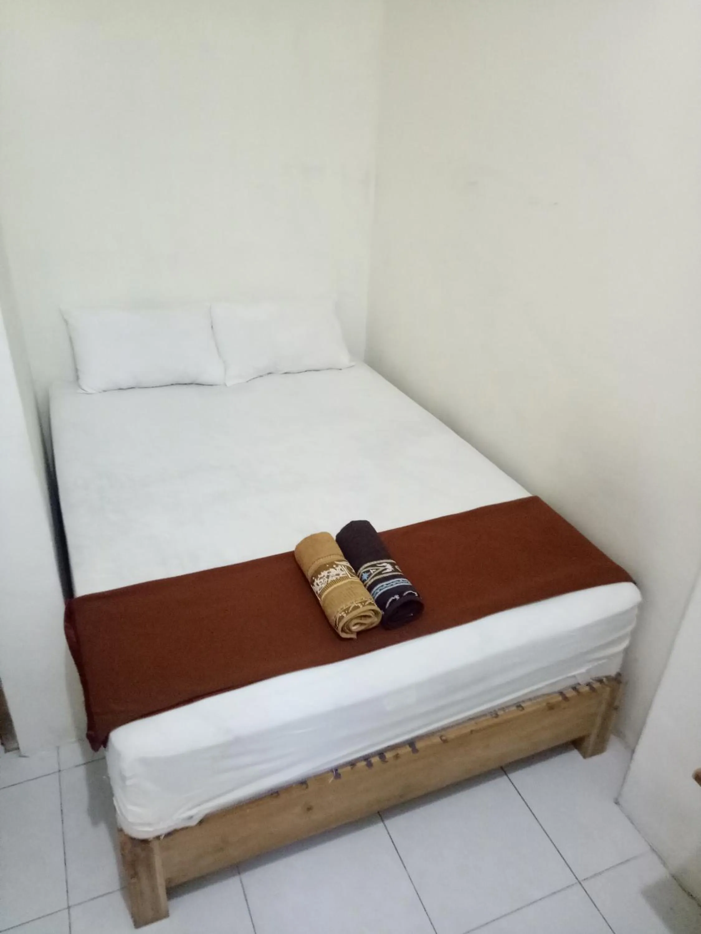 Bed in Losmen Fadel Malioboro Jogja