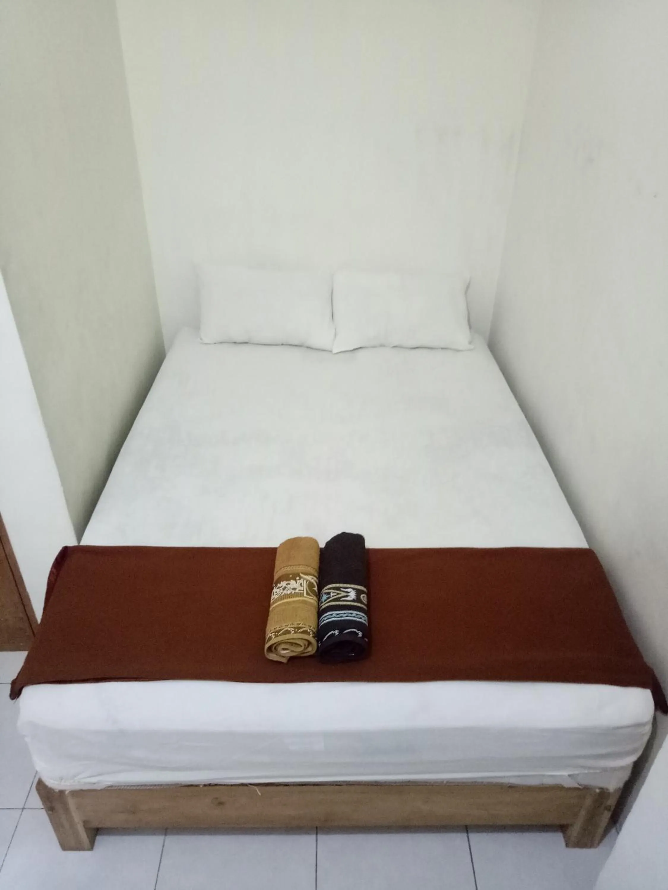 Bed in Losmen Fadel Malioboro Jogja