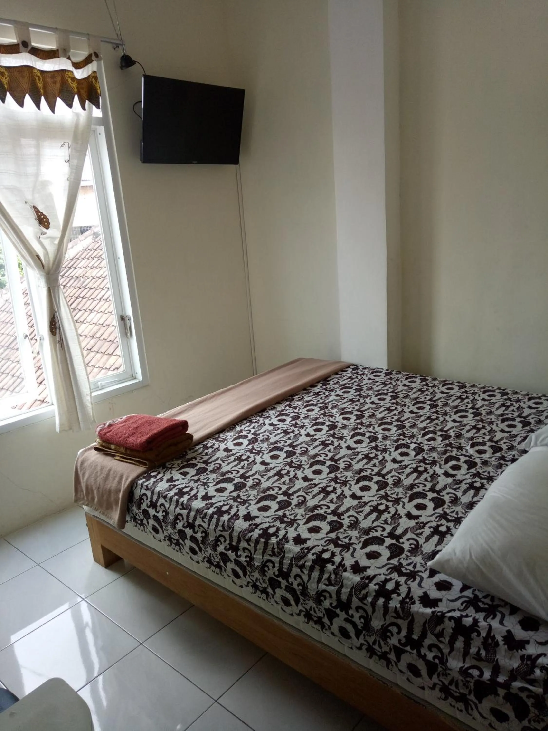 Bed in Losmen Fadel Malioboro Jogja