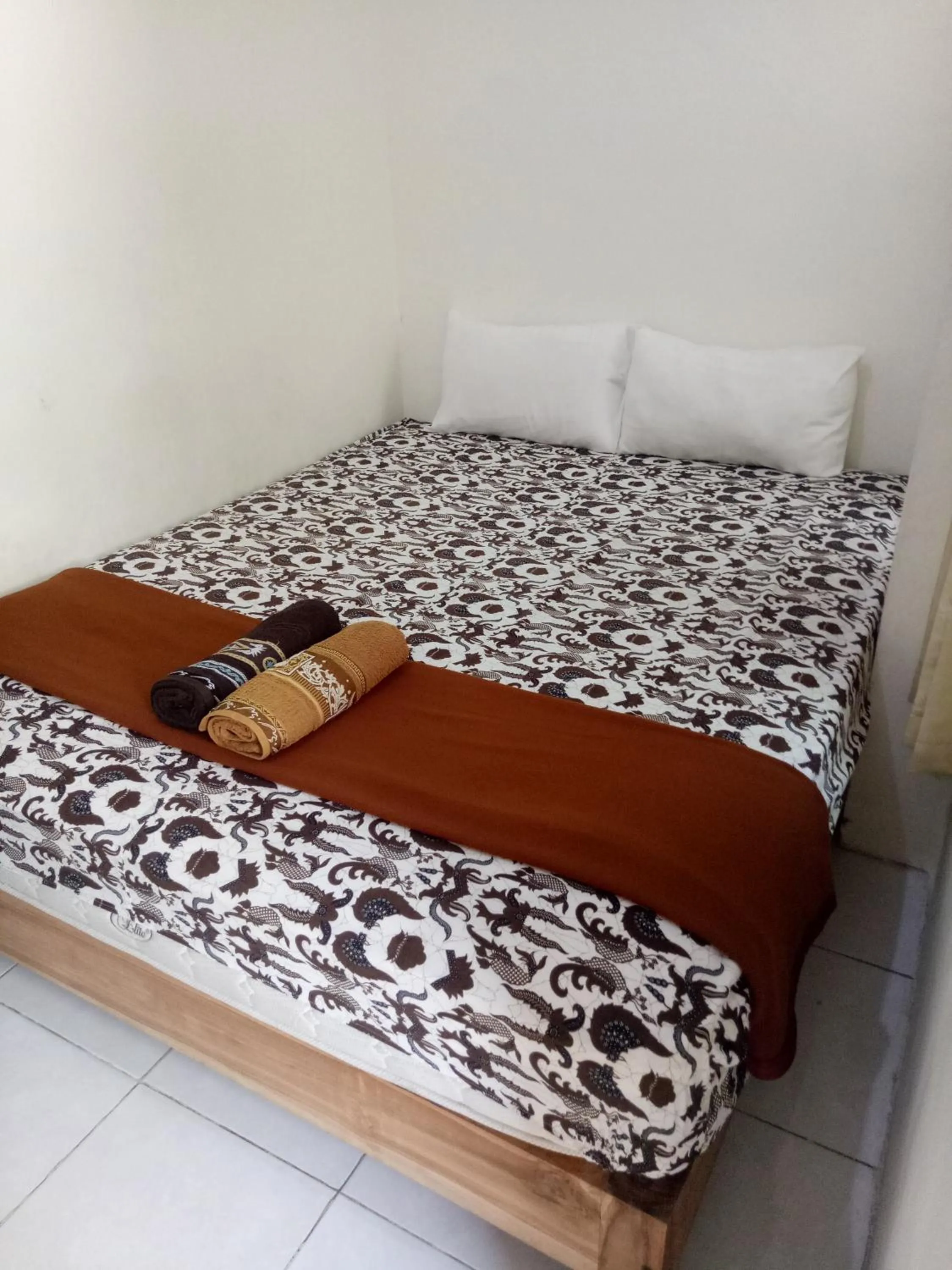 Bed in Losmen Fadel Malioboro Jogja