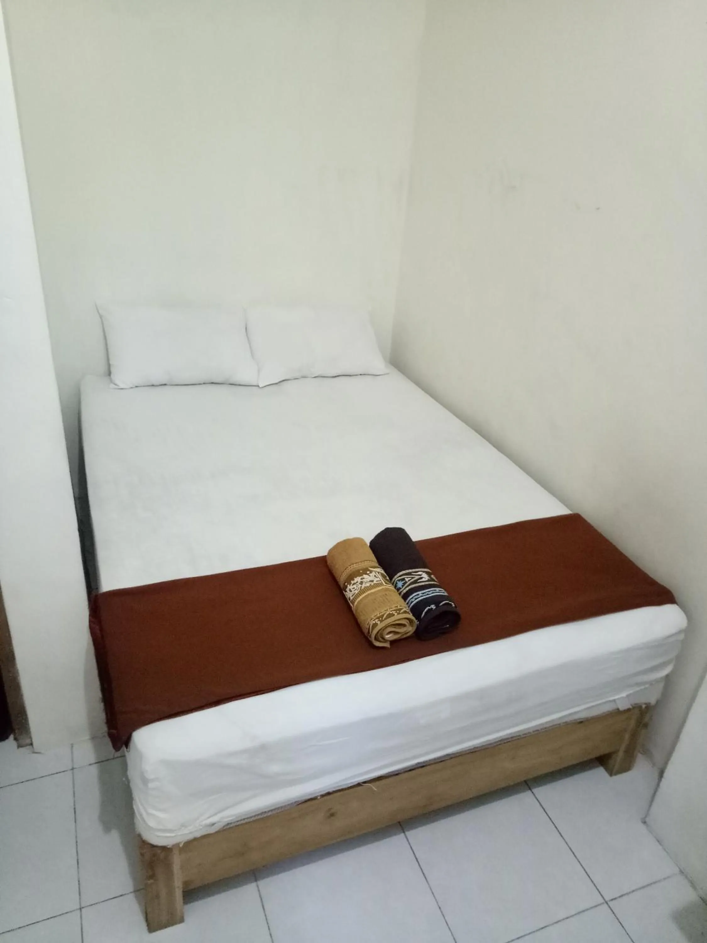 Bed in Losmen Fadel Malioboro Jogja