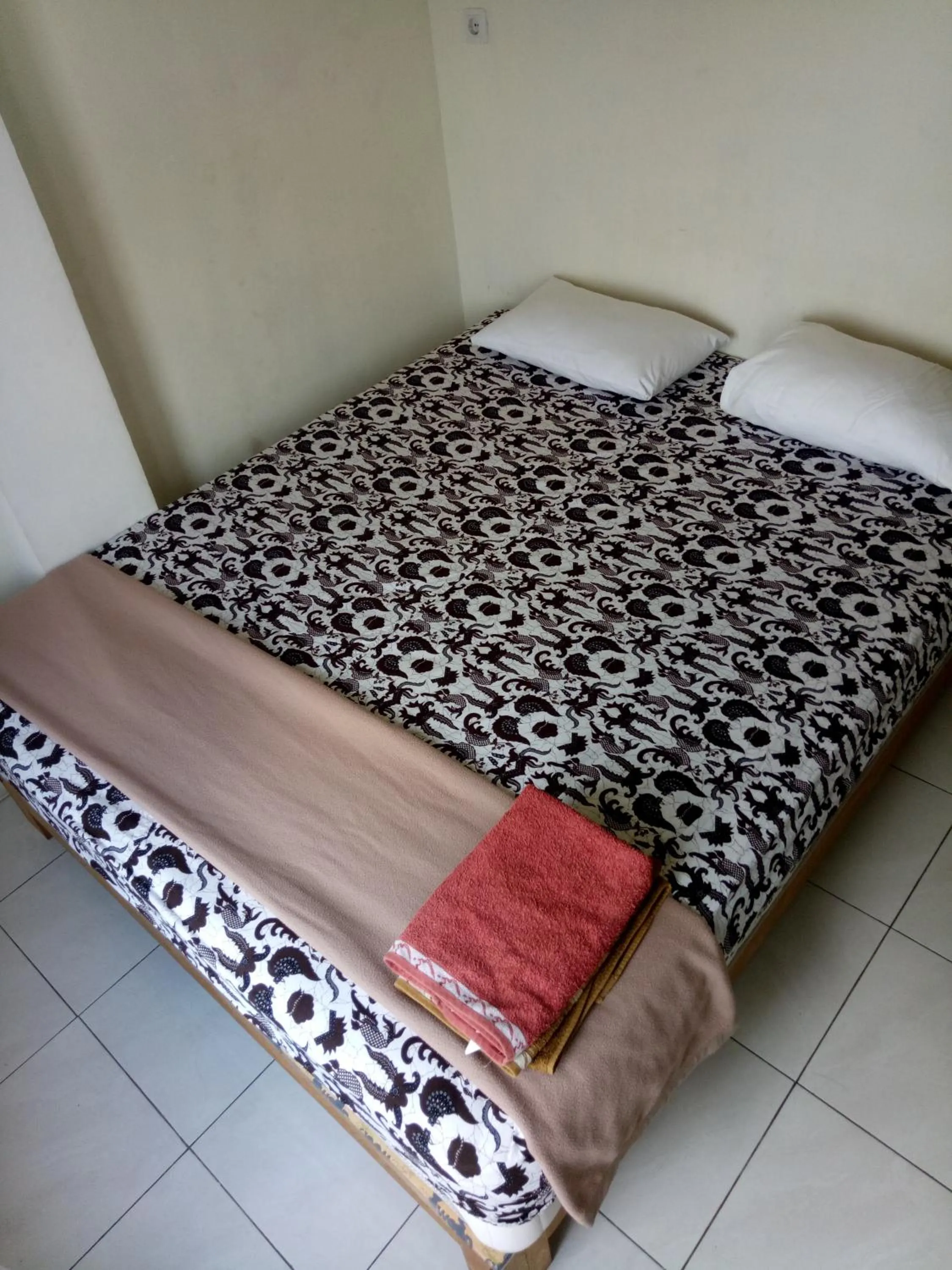 Bed in Losmen Fadel Malioboro Jogja