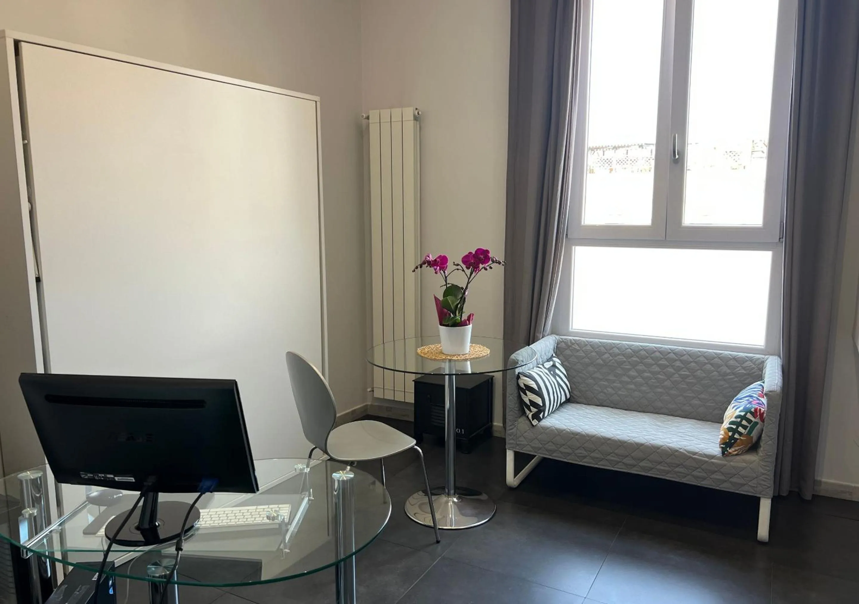 Seating area in Floor 6 Boutique Rooms by DOT Suites