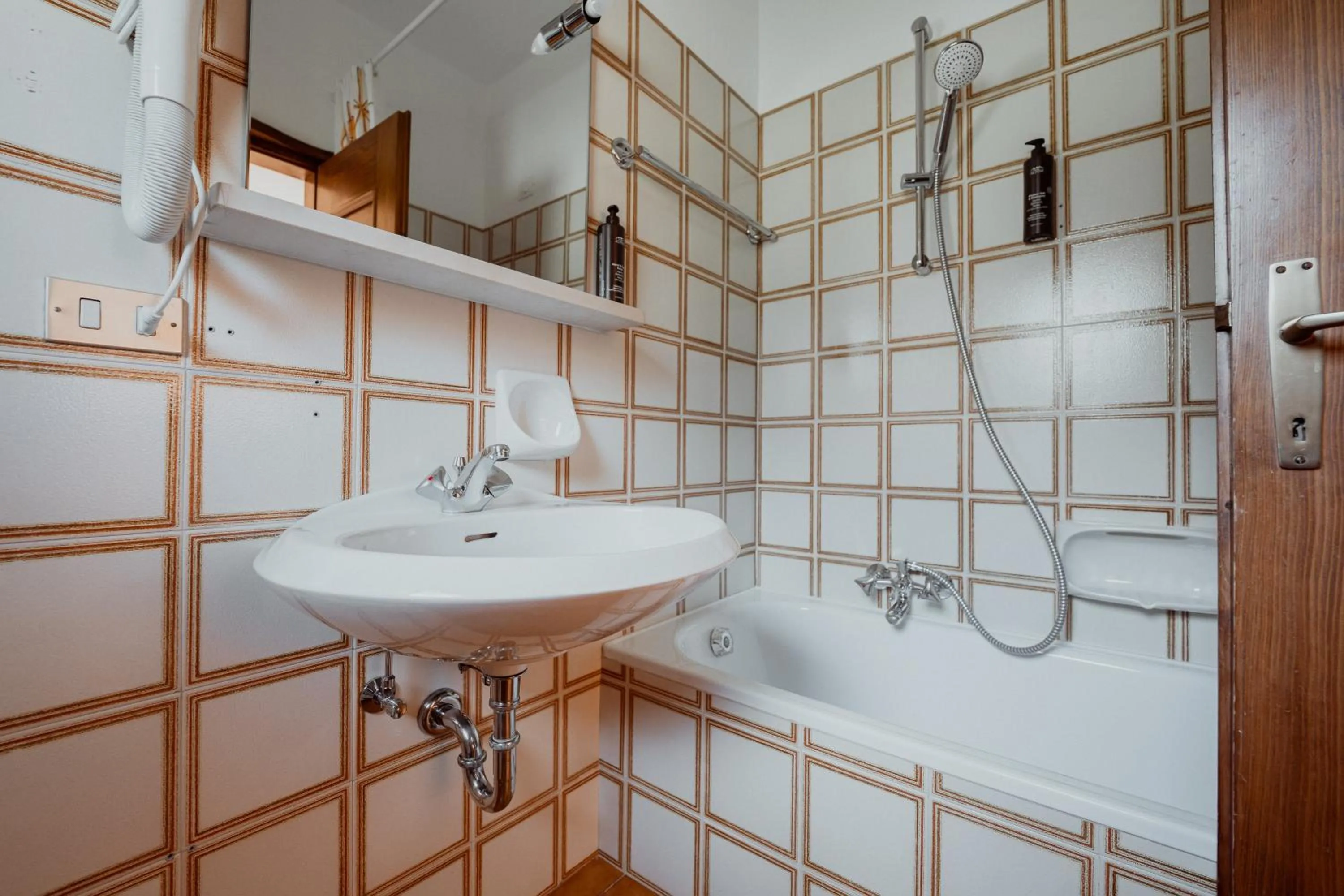 Bathroom in Dolomiti Sport Hotel