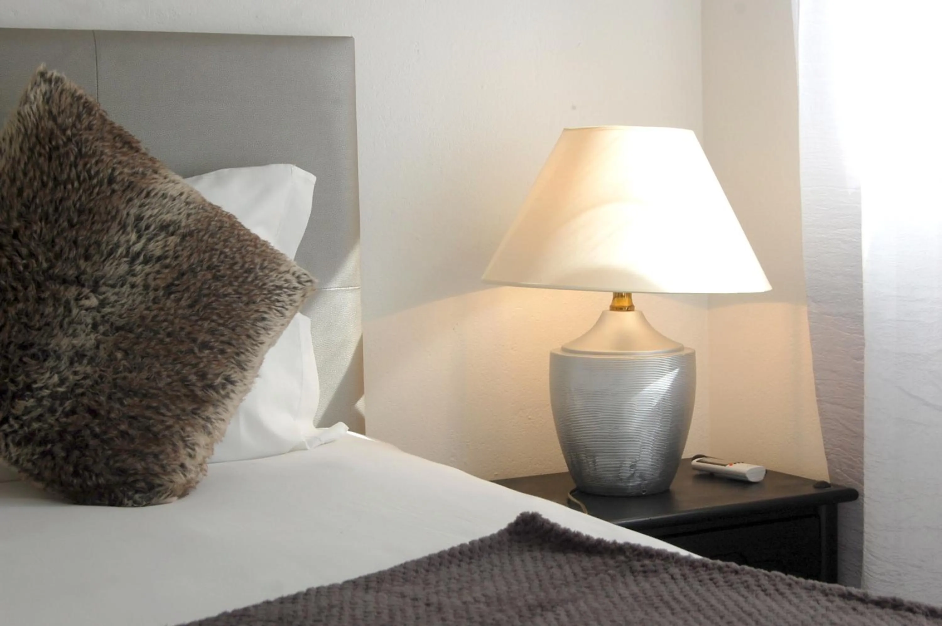 Bedroom, Bed in Suites Inn Lagos