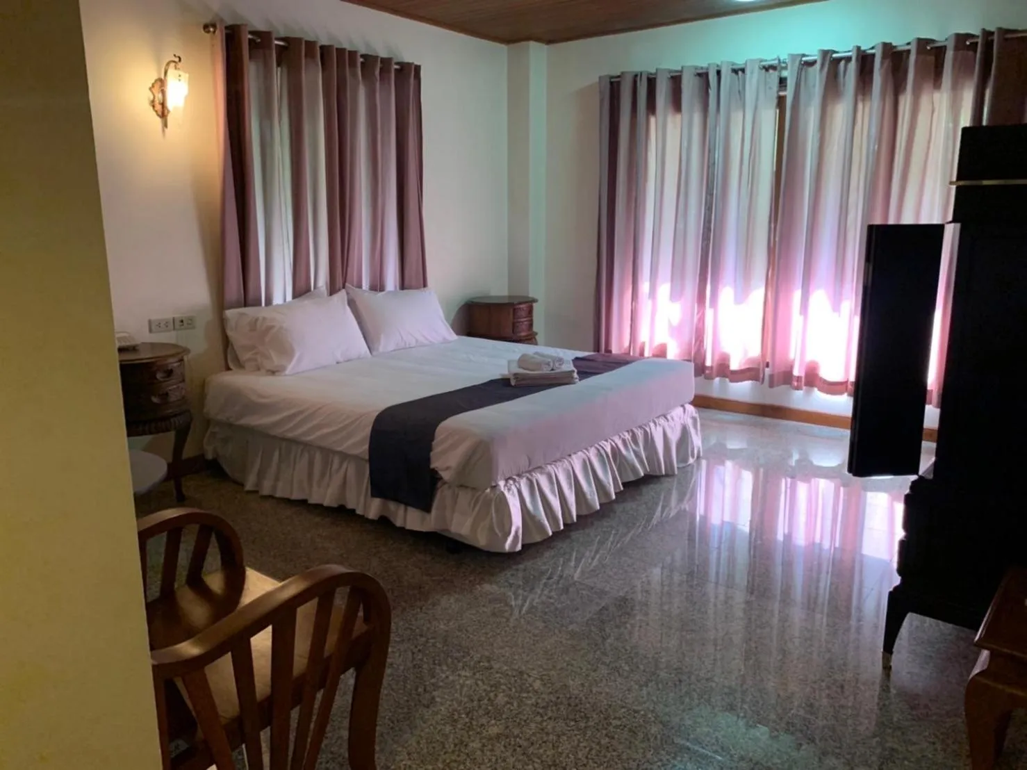 Bed in Tak Andaman Resort & Hotel