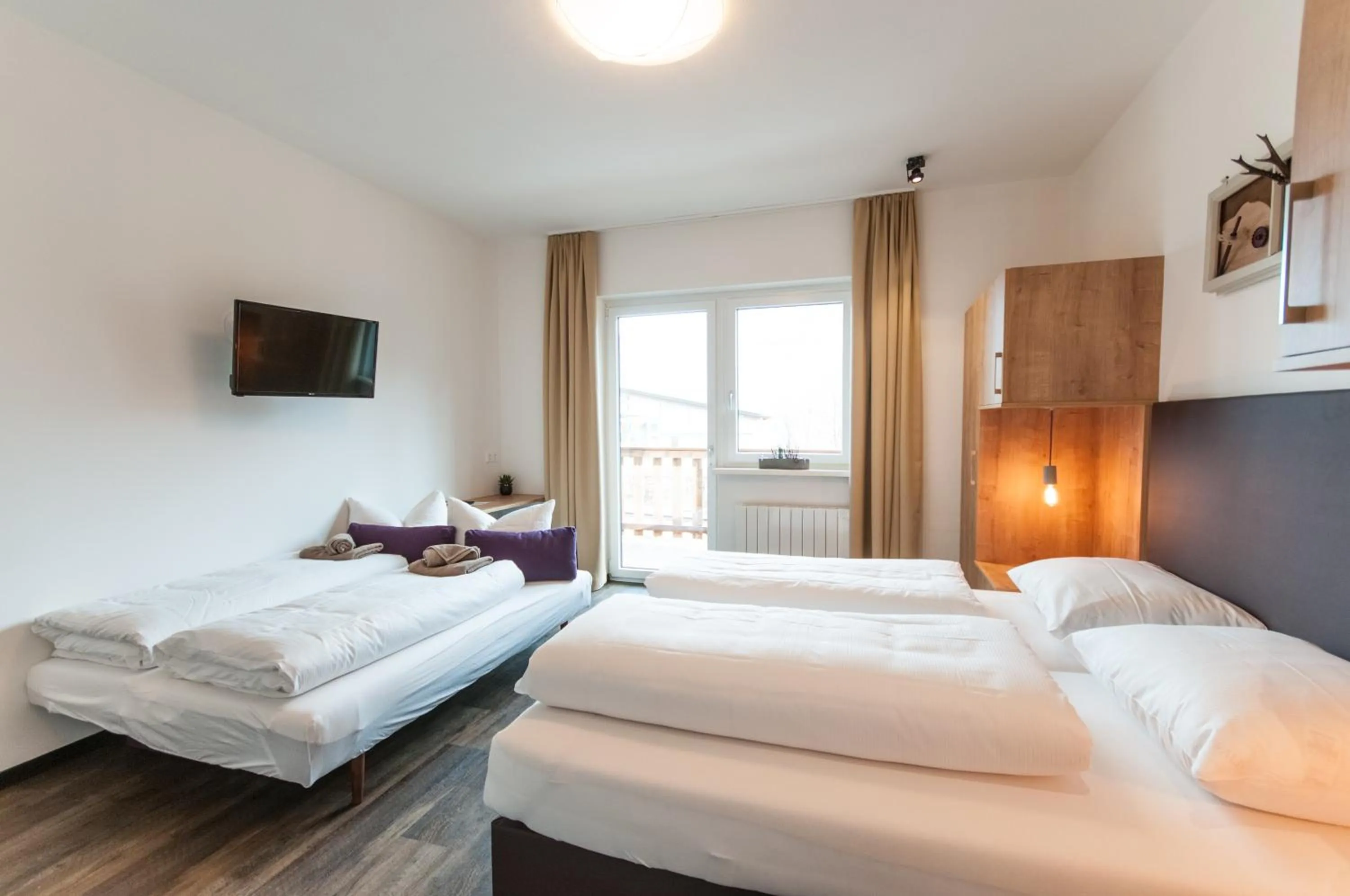 Decorative detail, Bed in Pension Max SUMMERCARD INCLUDED