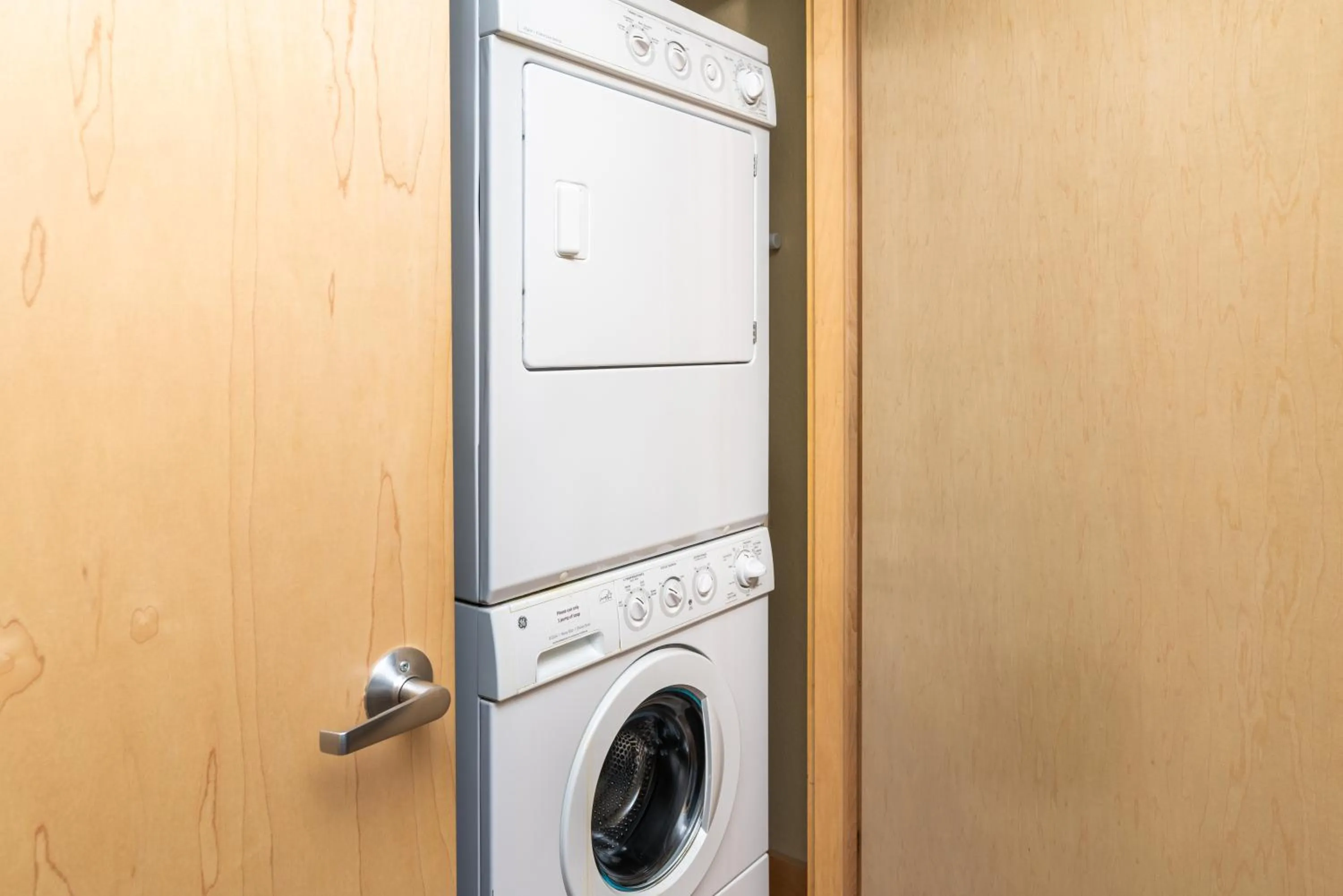 washing machine in East Bay Suites