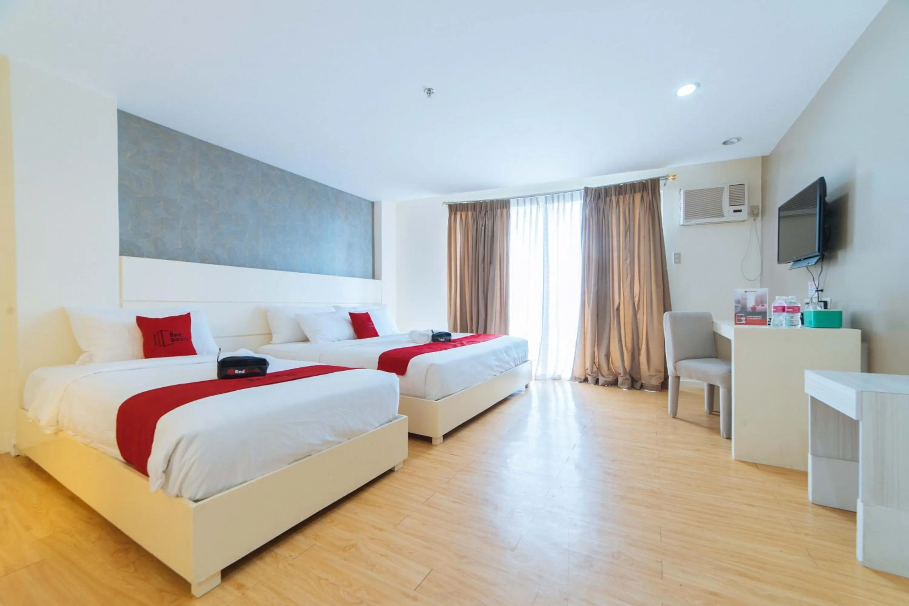 Bed in RedDoorz Plus at Hotel Metro Kalibo