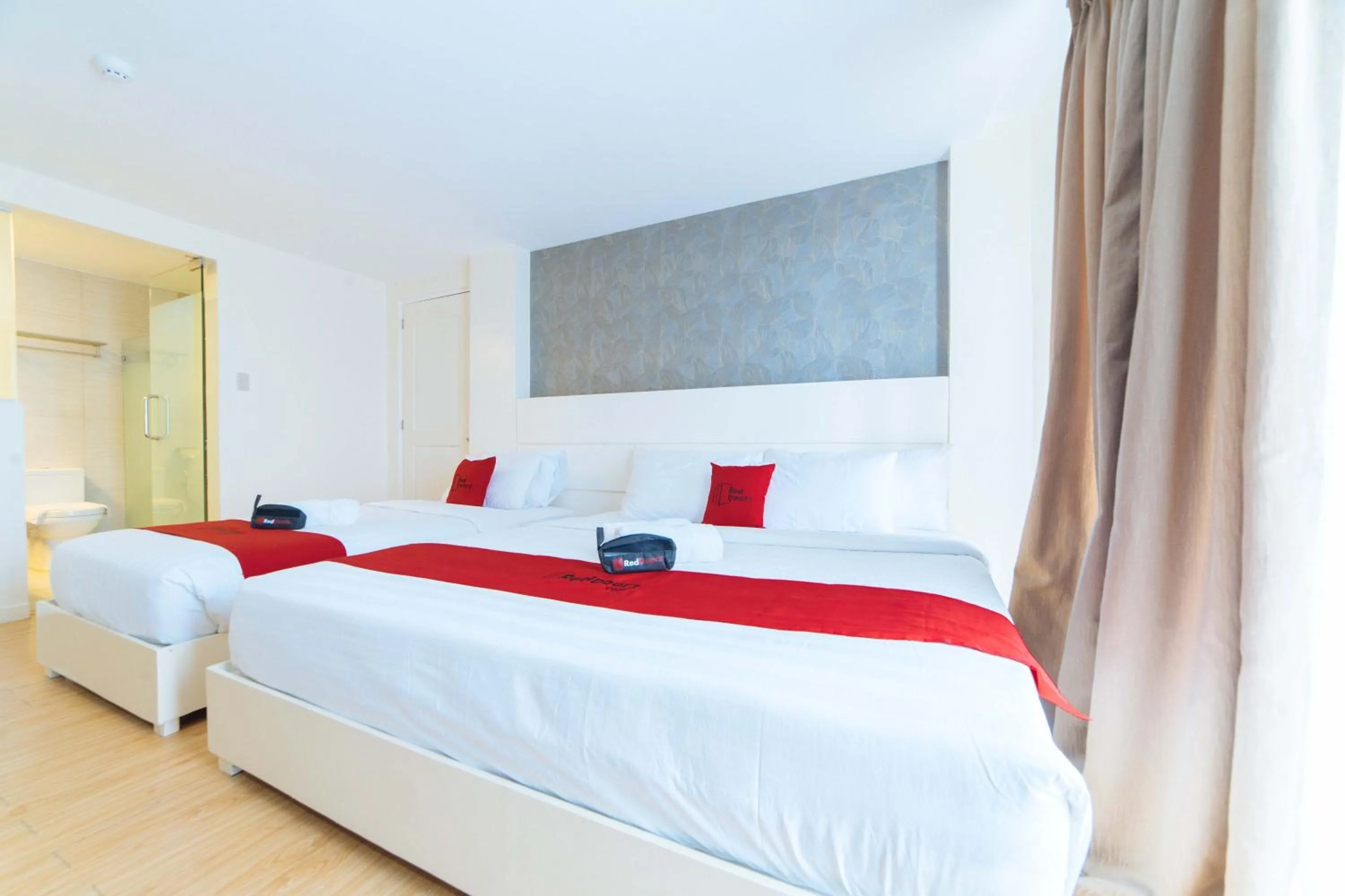 Bed in RedDoorz Plus at Hotel Metro Kalibo