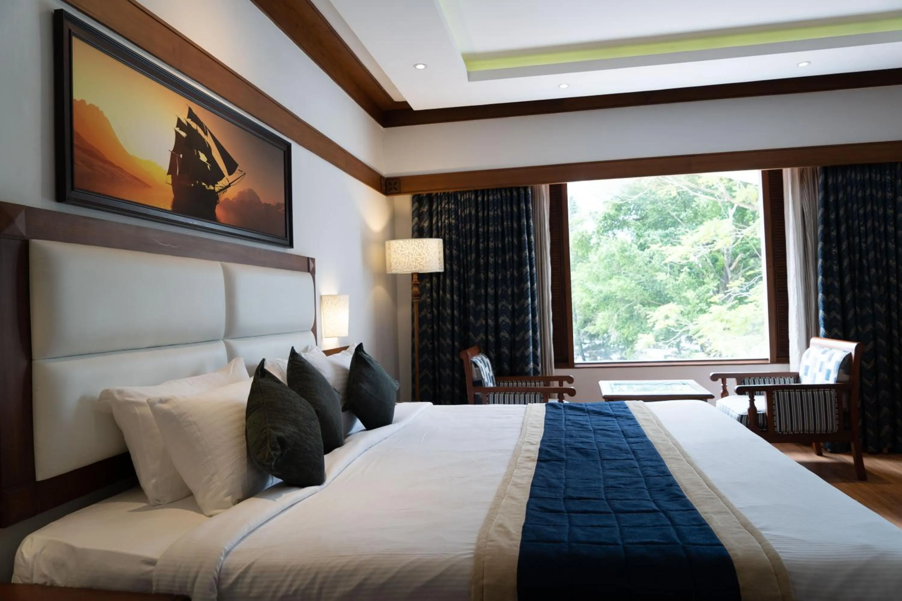 Bed in KTDC Mascot Hotel - A Heritage Living Experience