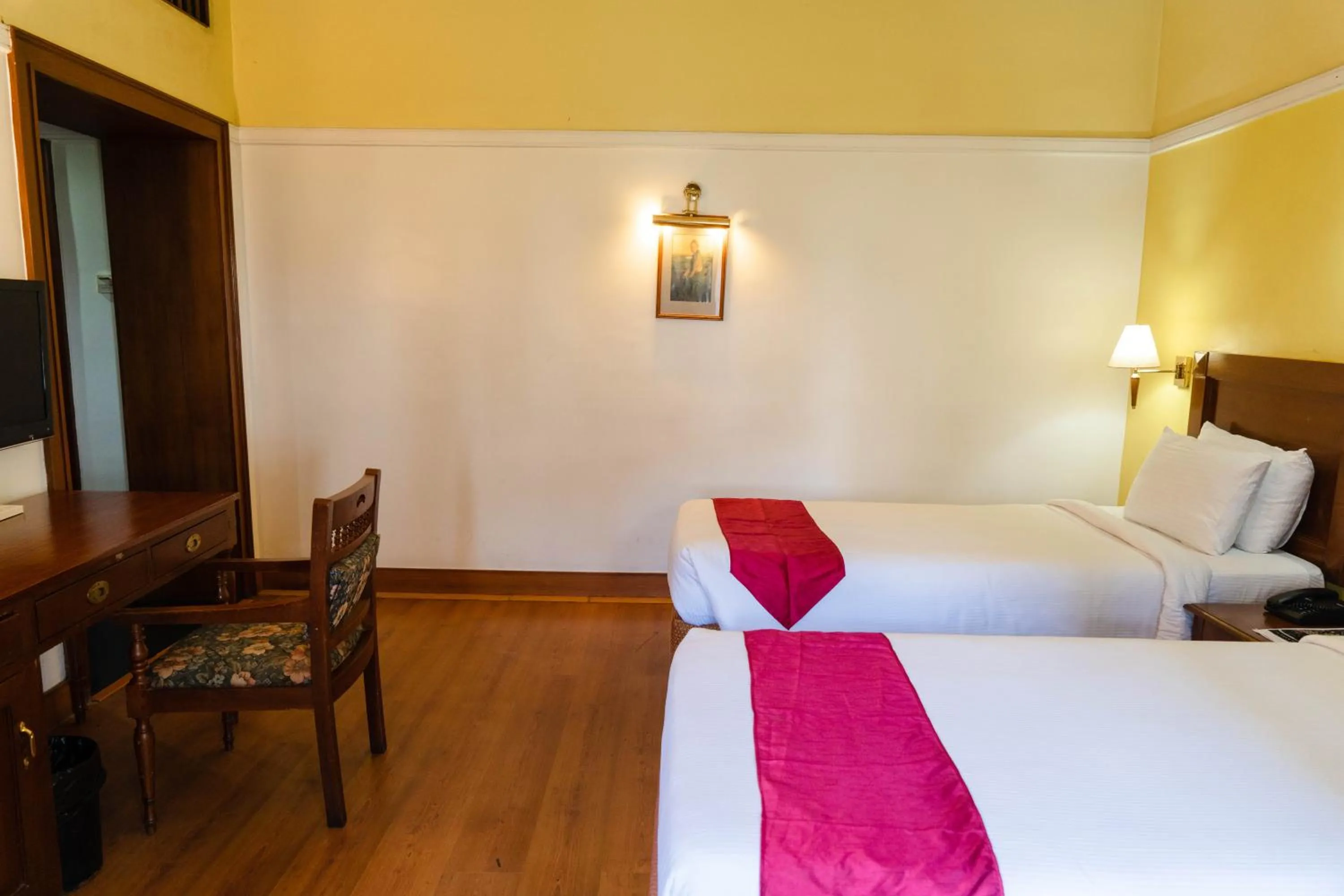 Bed in KTDC Mascot Hotel - A Heritage Living Experience